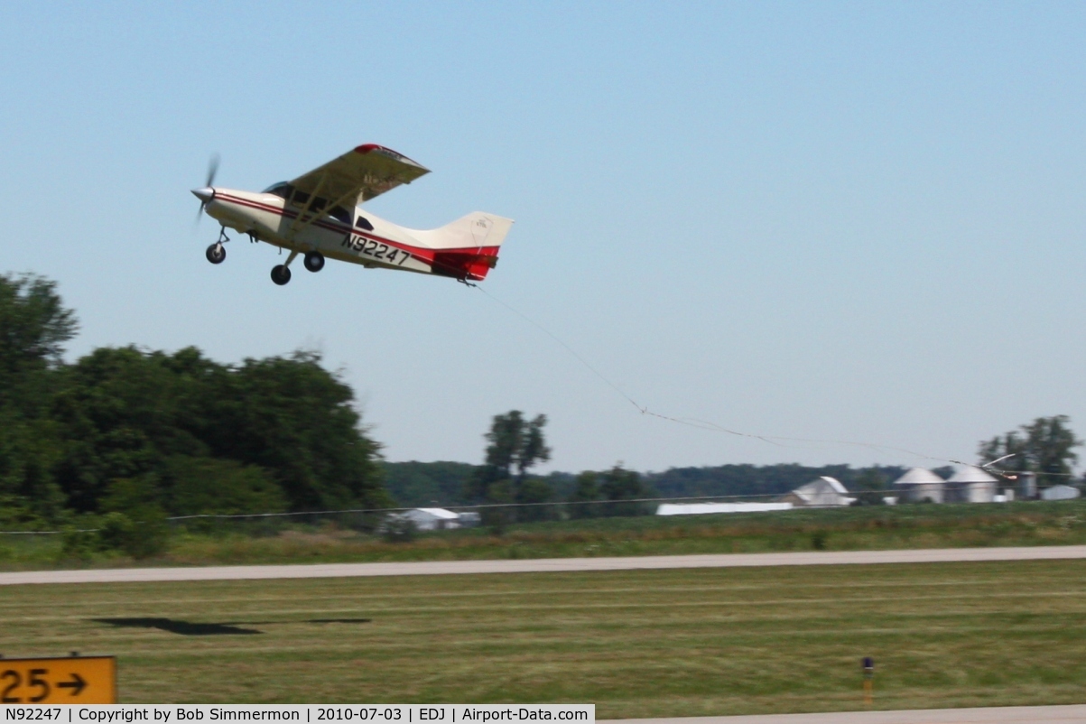 N92247, Maule MXT-7-180 Star Rocket C/N 14022C, Making a pass to hook a banner during the Bellefontaine air show.