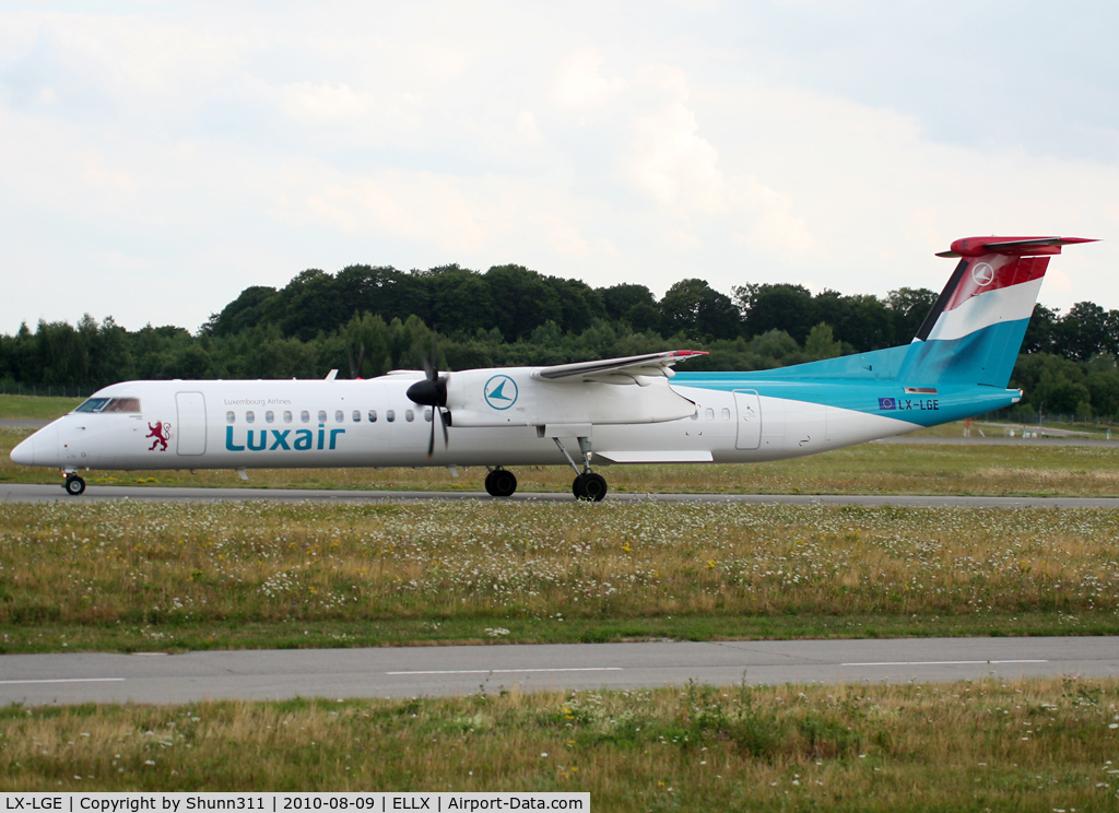 LX-LGE, 2009 De Havilland Canada DHC-8-402Q Dash 8 C/N 4284, Taxiing holding point rwy 24 for departure...