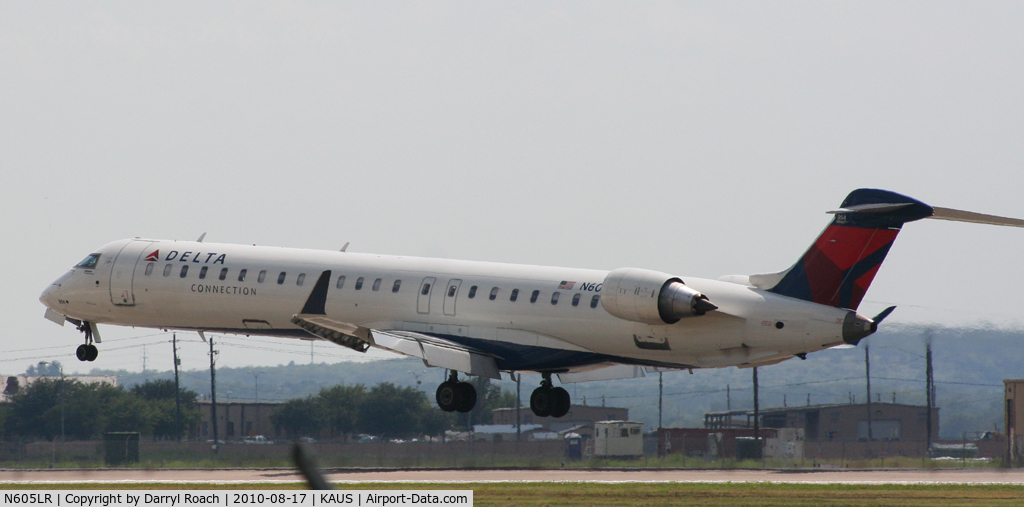 N605LR, 2008 Bombardier CRJ-900ER (CL-600-2D24) C/N 15160, DAL CRJ touches down 17L.