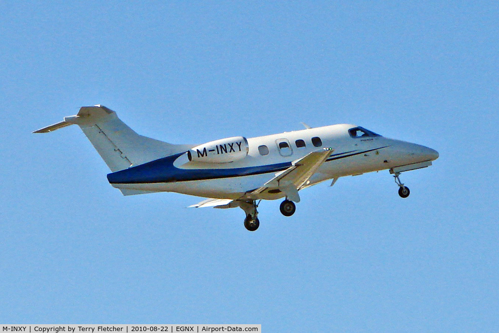 M-INXY, 2009 Embraer EMB-500 Phenom 100 C/N 50000024, Based 2009 Embrear EMB500 Phenom-100, c/n: 50000024 climbs away from East Midlands