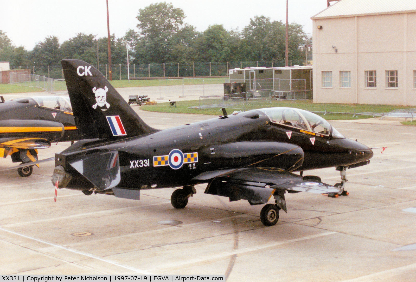 XX331, 1980 Hawker Siddeley Hawk T.1A C/N 177/312155, Hawk T.1A, callsign Archer, of RAF Leeming's 100 Squadron on the flight-line at the 1997 Intnl Air Tattoo at RAF Fairford.