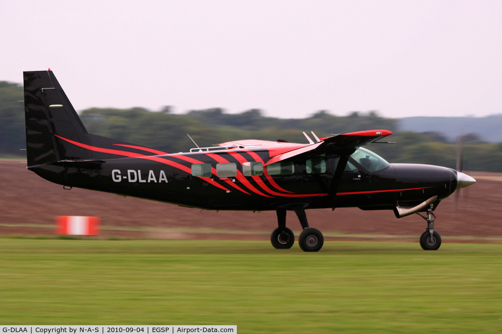 G-DLAA, 2003 Cessna 208 Caravan I C/N 20800367, Landing after another drop