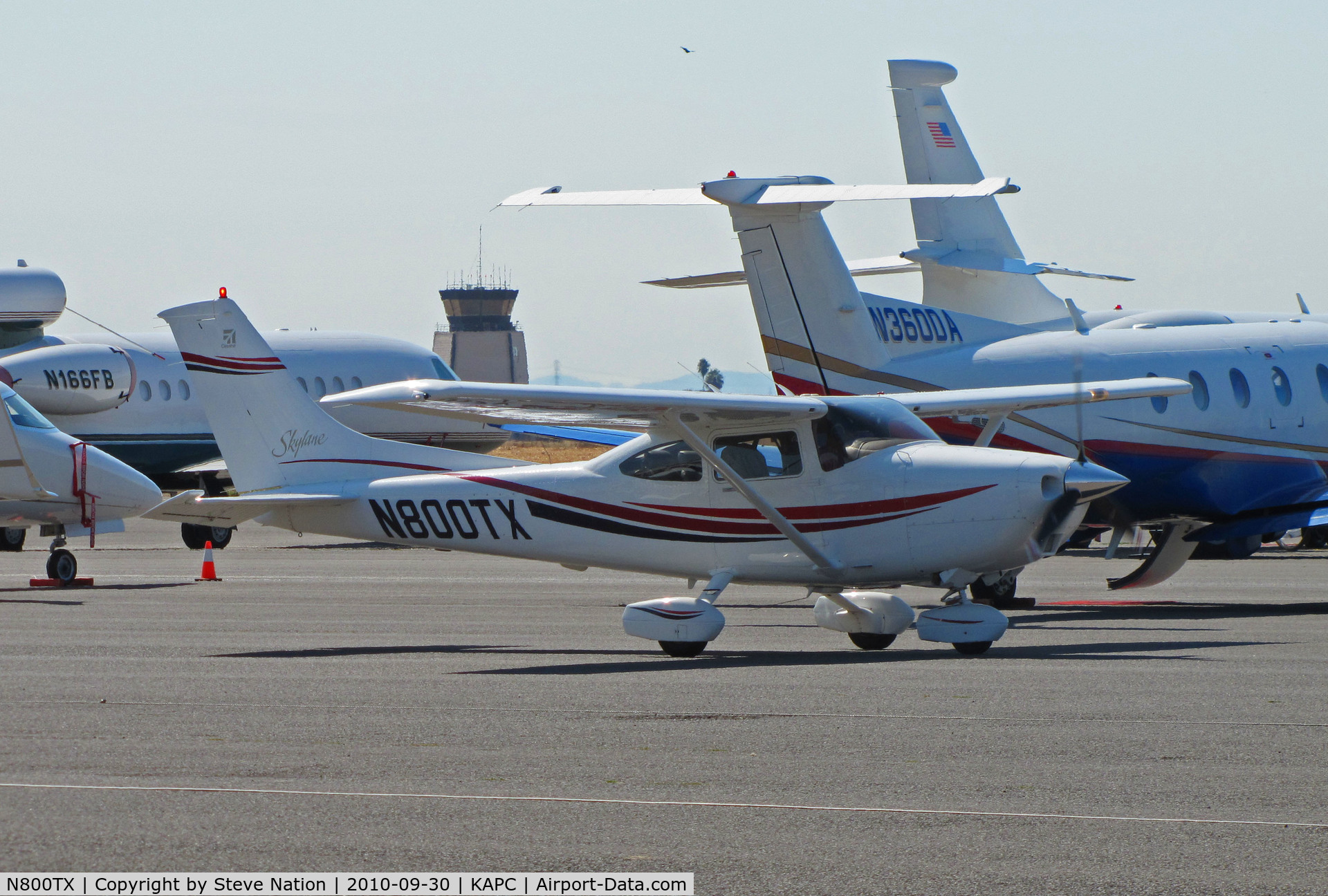 N800TX, 1999 Cessna 182S Skylane C/N 18280526, Southern California-based 1999 Cessna 182S taxiing across bizjet ramp for trip home to KCMA (Camarillo, CA)