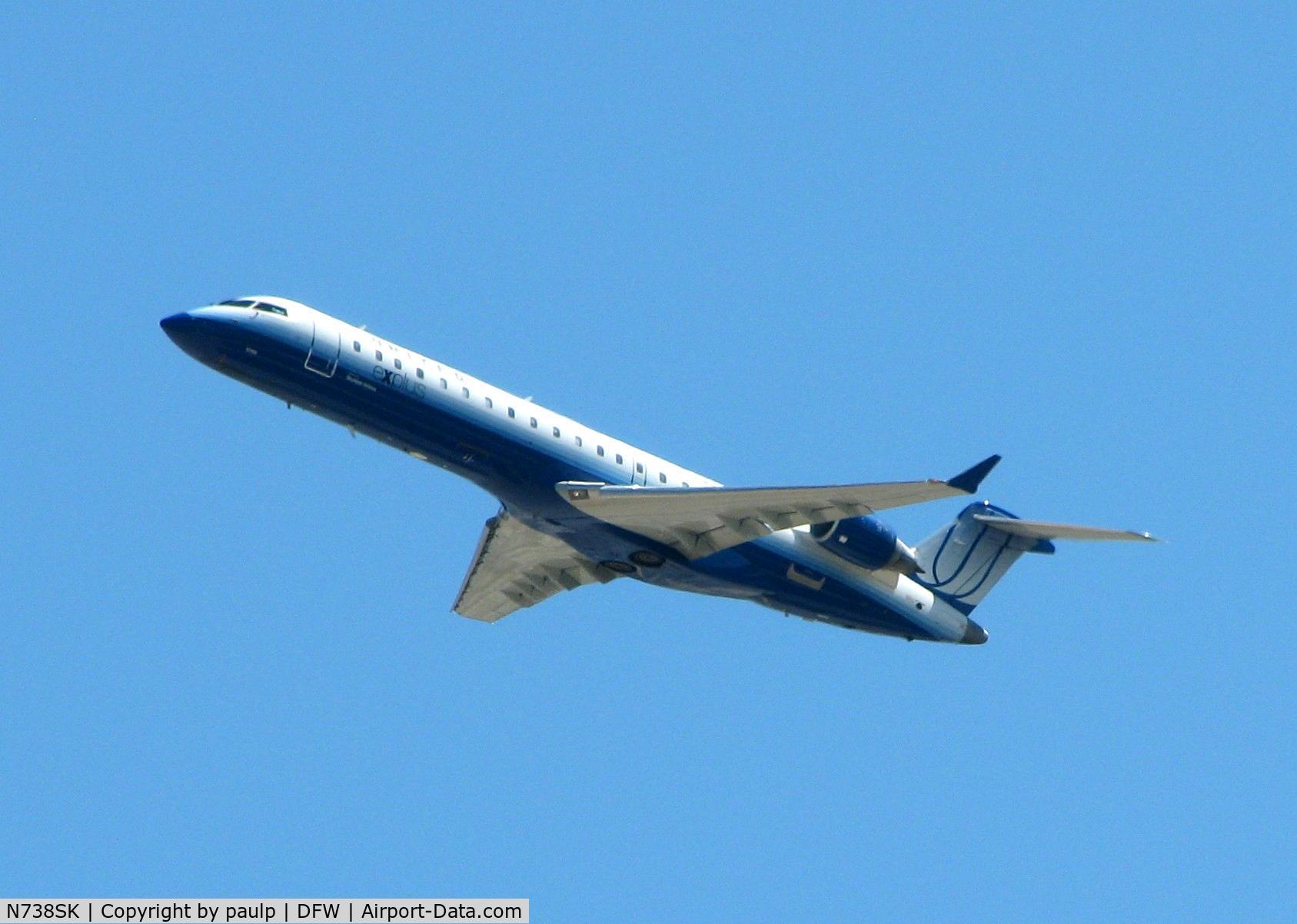 N738SK, 2005 Bombardier CRJ-700 (CL-600-2C10) Regional Jet C/N 10195, Taking off from DFW.