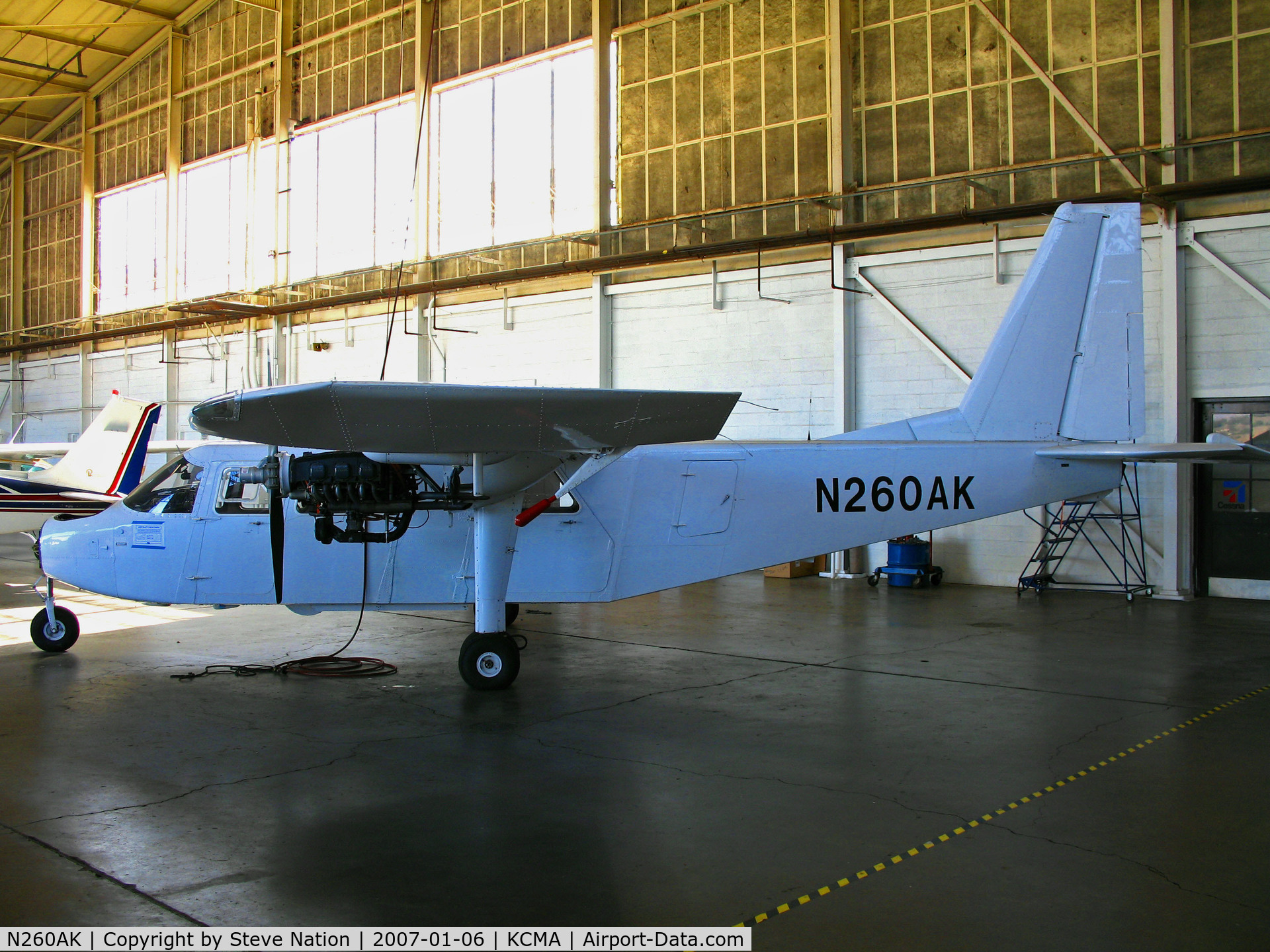 N260AK, 1969 Britten-Norman BN-2A Islander C/N 97, Ethereral hangar shot of Locally-based all white 1969 BN-2A owned by Channel Islands Aviation/CIA with nose cone removed and cowling covers missing (sold to operator in Panama in Jan 2009)