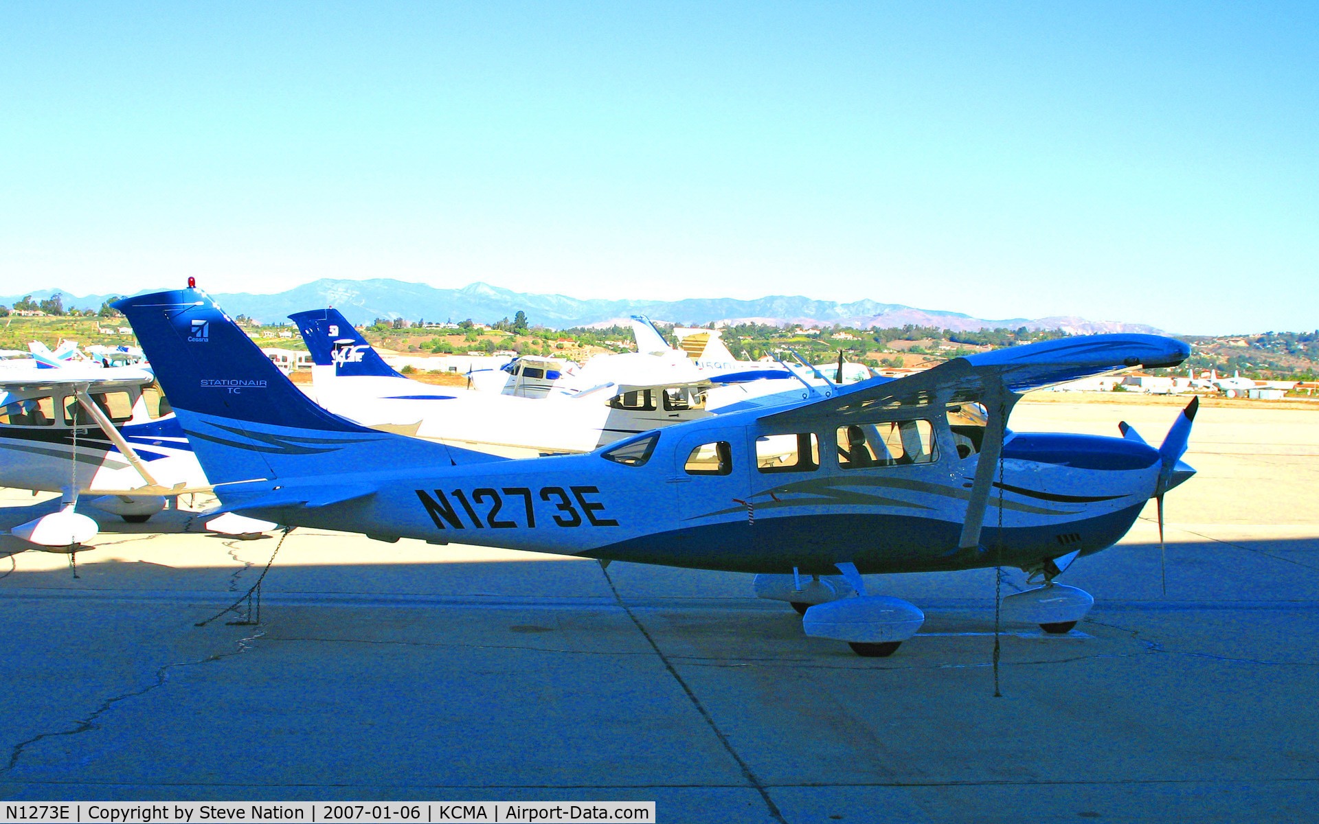 N1273E, 2006 Cessna T206H Turbo Stationair C/N T20608678, 2006 Cessna T206H on hangar at Camarillo Airport, CA home base on balmy, sunny January 2007 picture postcard day (experienced landing accident at Grand Canyon NP Airport, CO on April 28,2007; re-registered N127JE))