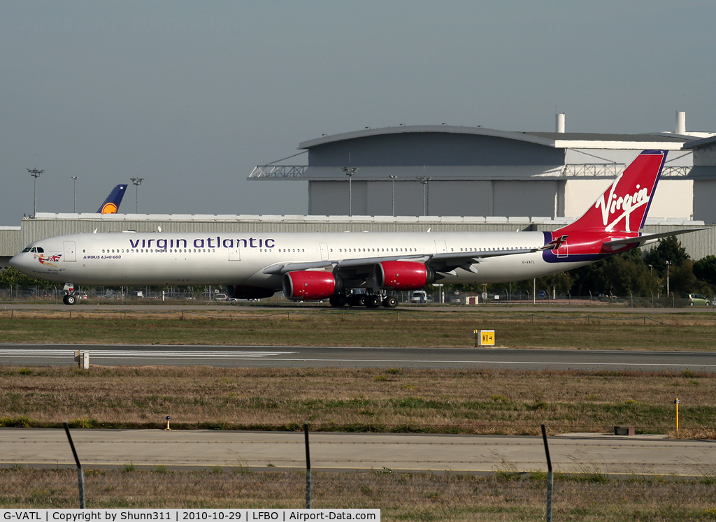 G-VATL, 2001 Airbus A340-642 C/N 376, Taxiing holding point rwy 14R for departure after long term storage at LFBT...