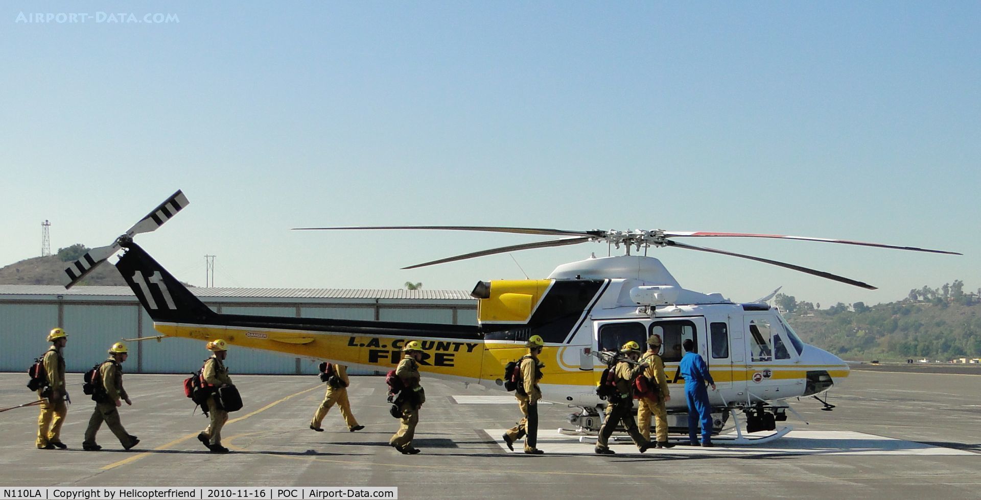 N110LA, 2005 Bell 412EP C/N 36392, Fire fighters being taken to ship for practice loading and unloading