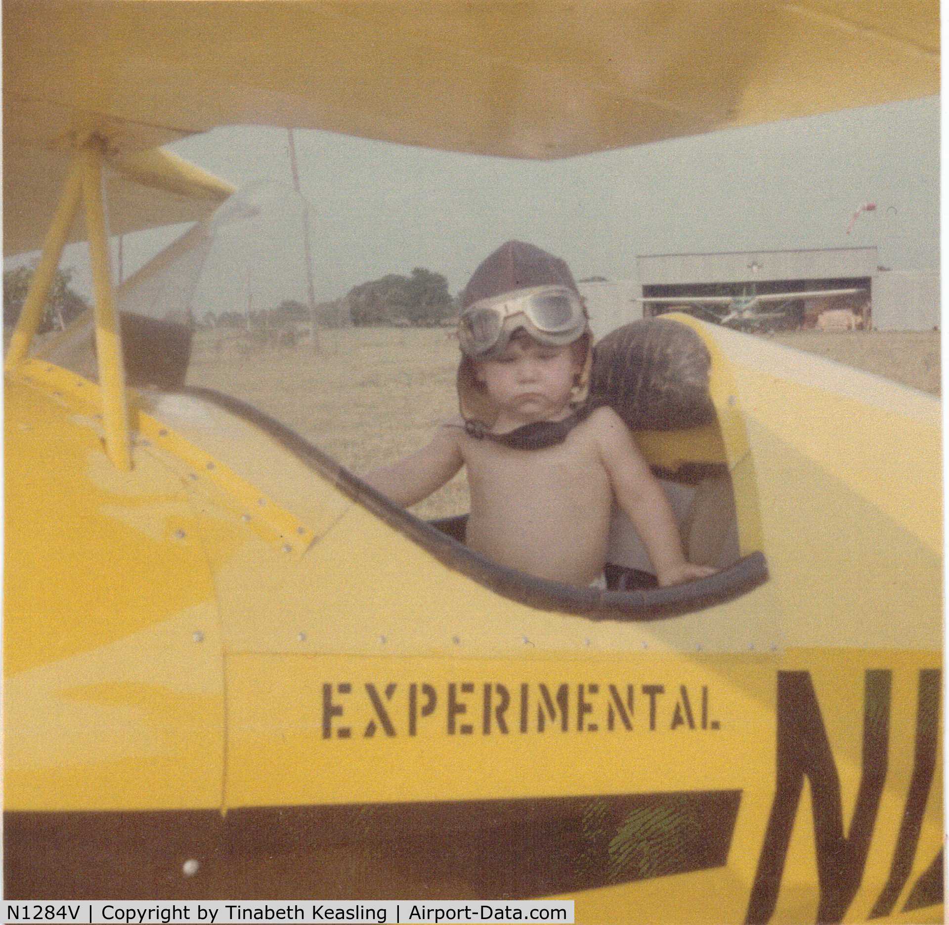 N1284V, Mong Sport PSA-1 C/N 100, Jimmy Brown is in the Mong PSA-1 (N1284V) in 1970 at Fairview Field, Richards, Texas.  Photo, taken by his mom, is now featured on the back cover of his newly published book, Texas Greed.
