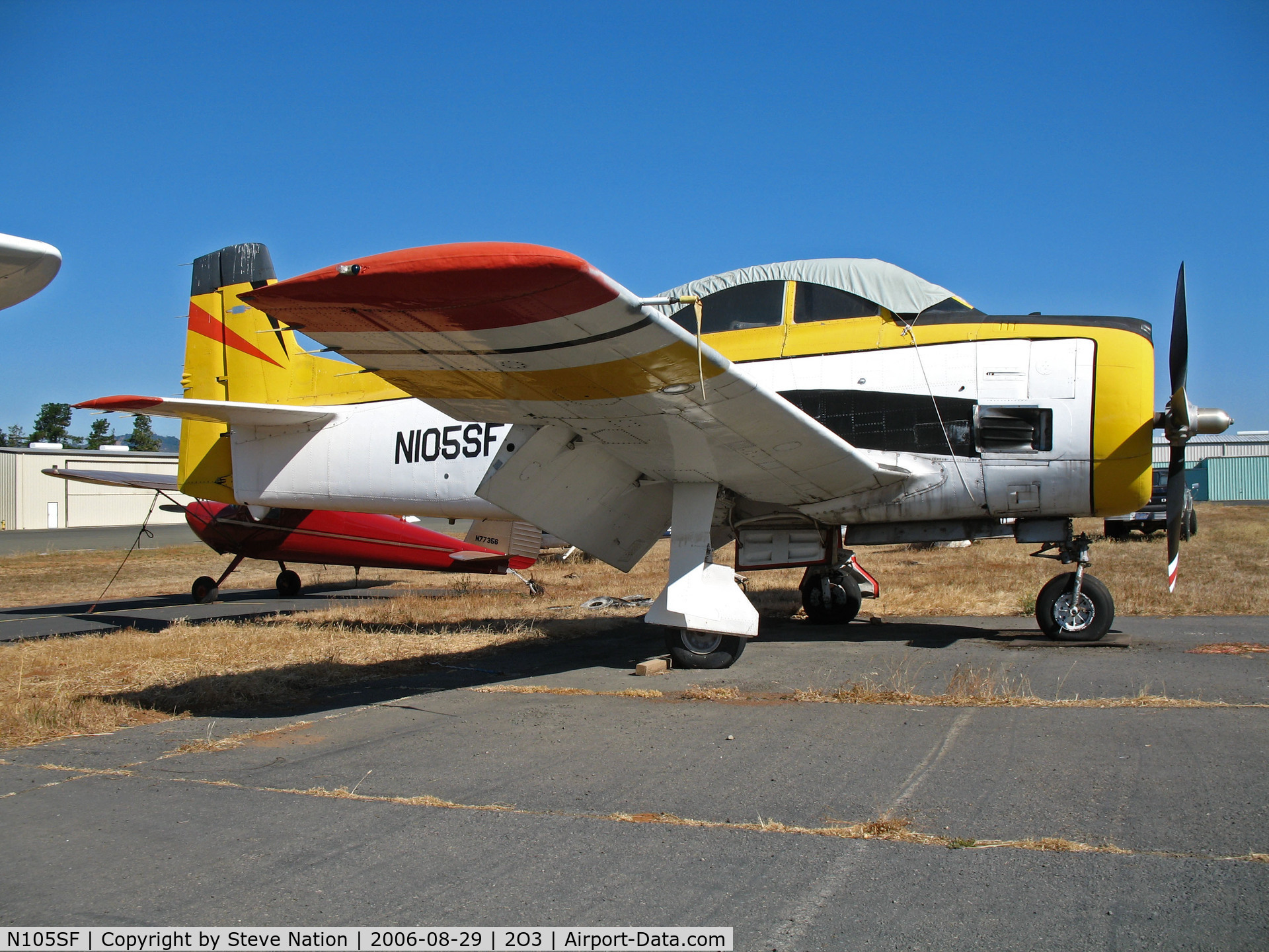 N105SF, North American T-28B Trojan C/N 200-412 (138341), North American T-28B with canopy cover @ Parrett Field, Angwin, CA (with owner in Jean, NV by Aug 2009)