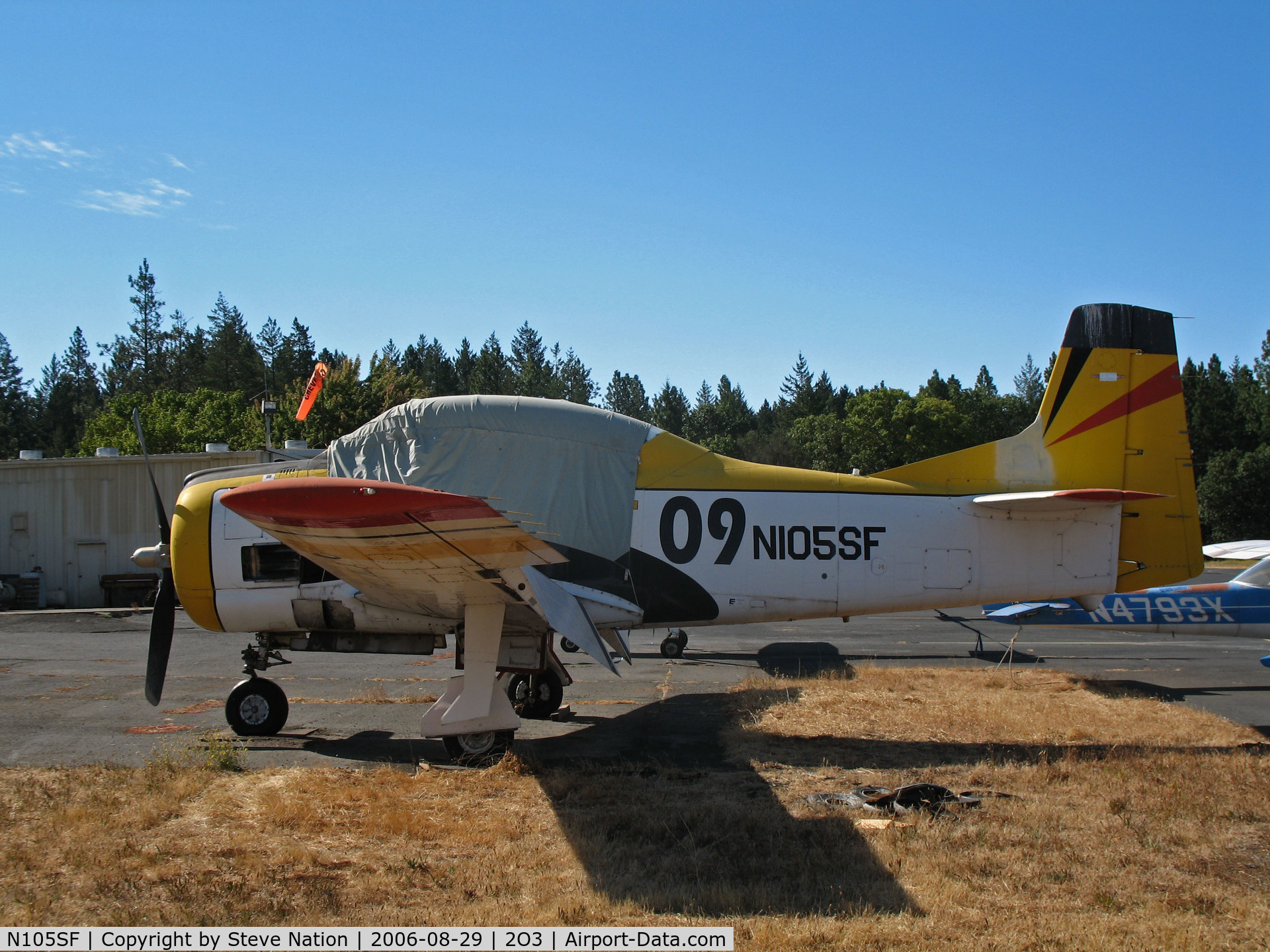 N105SF, North American T-28B Trojan C/N 200-412 (138341), North American T-28B with canopy cover and race # 09 @ Parrett Field, Angwin, CA (with owner in Jean, NV by Aug 2009)