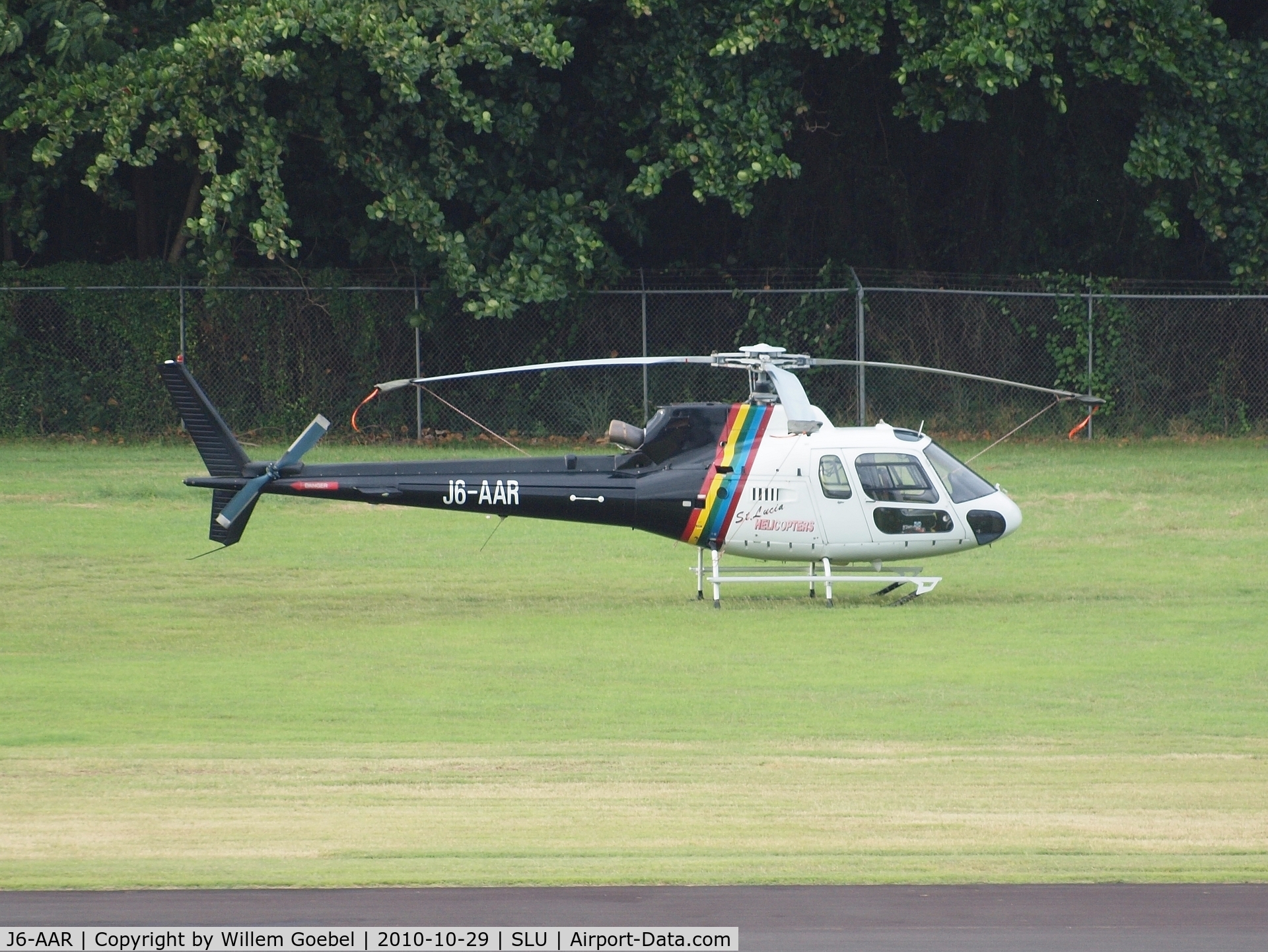J6-AAR, Aerospatiale AS-350B Ecureuil C/N 3869, Parking on airstrip from Castries on st Lucia.(st Lucia Helicopters AS350B c/n3869