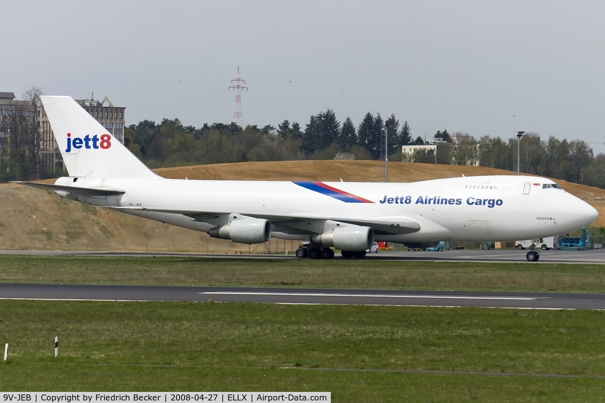 9V-JEB, 1985 Boeing 747-281F C/N 23350, taxying to the cargo center