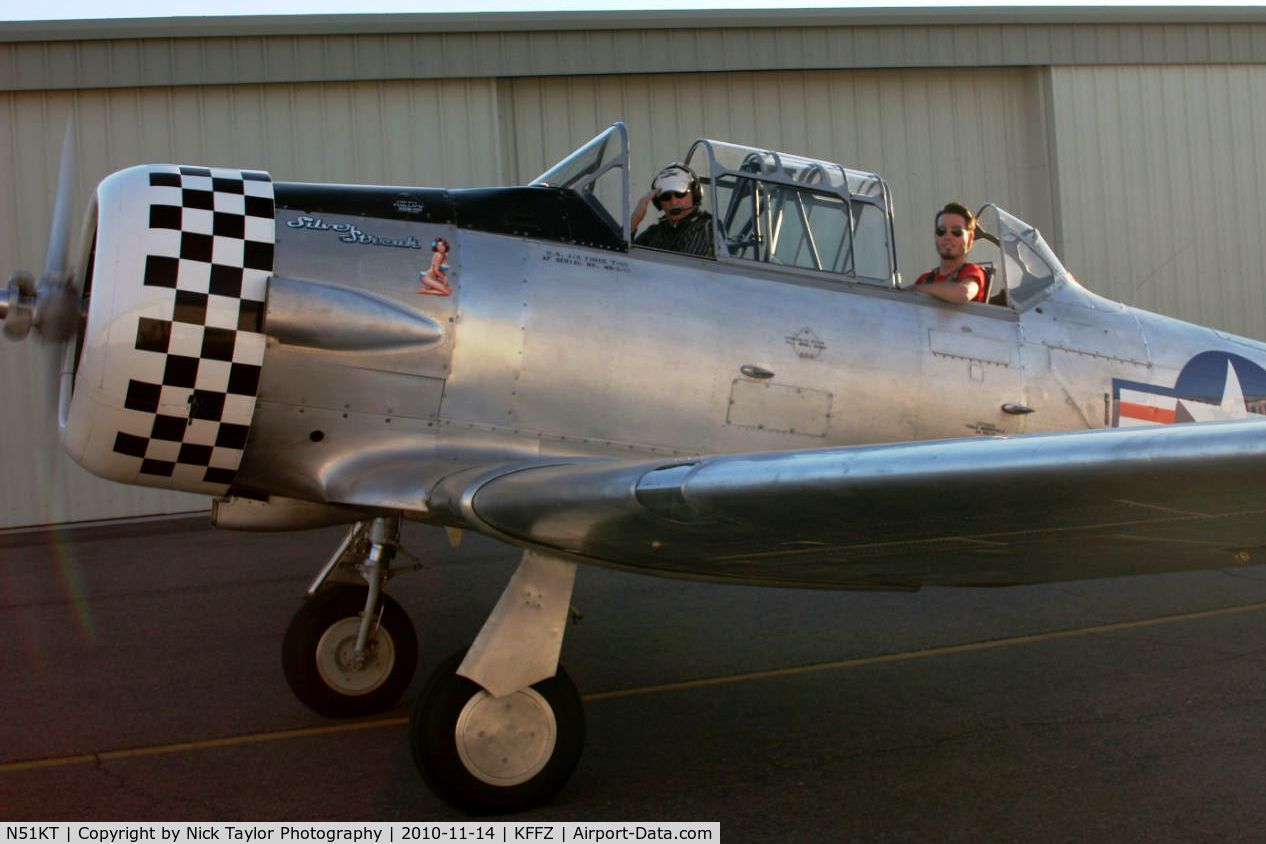 N51KT, 1951 North American T-6G Texan C/N 168-370, Photographer heading out to fly the T-6G