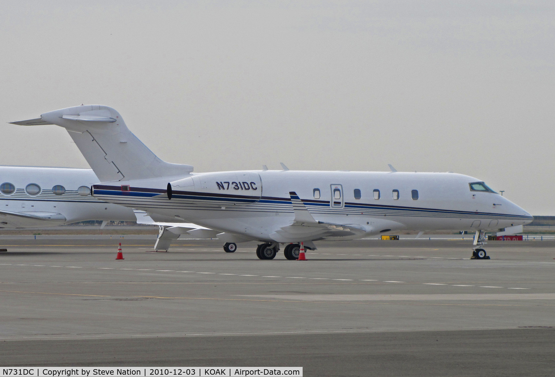 N731DC, 2005 Bombardier Challenger 300 (BD-100-1A10) C/N 20073, Geoduck Aviation (Seattle, WA) 2005 Bombardier BD-100-1A10 visiting on North Field ramp @ Oakland International Airport, CA