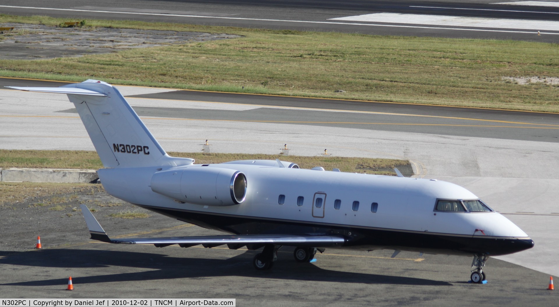 N302PC, 1982 Canadair Challenger 600S (CL-600-1A11) C/N 1072, N302PC park at the cargo ramp at TNCM