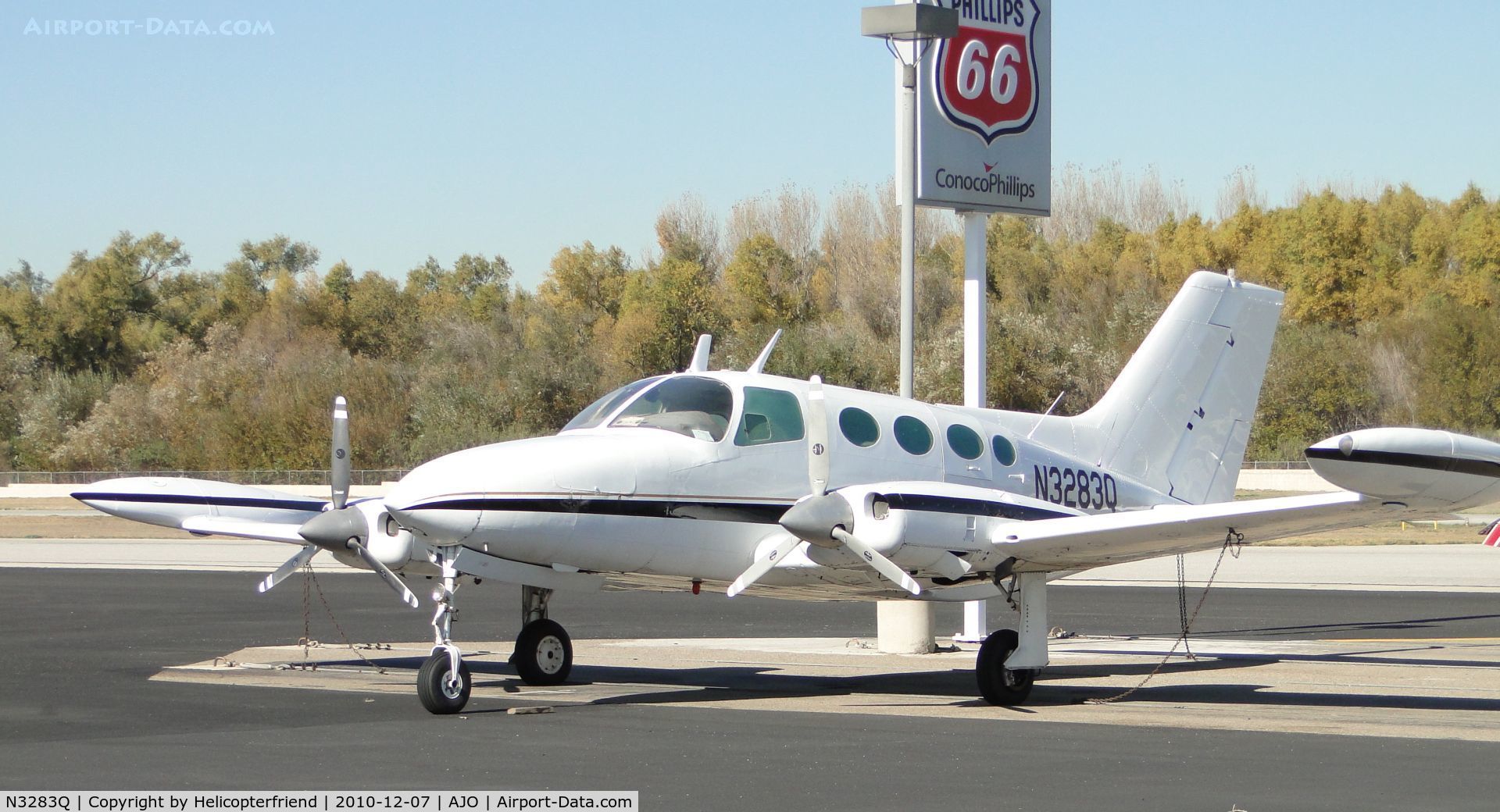 N3283Q, 1967 Cessna 402 C/N 402-0083, Parked next to Phillip 66 sign