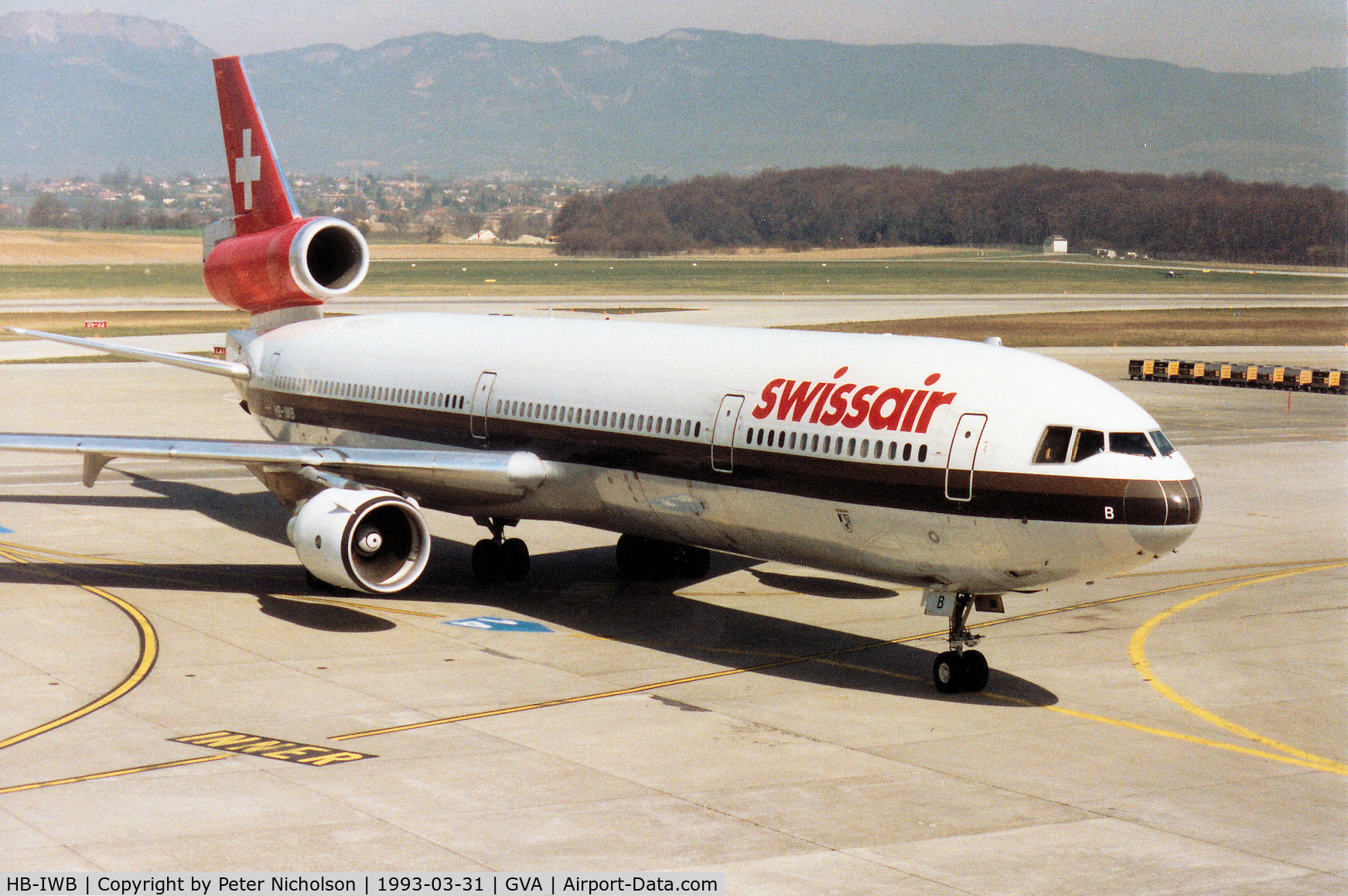 HB-IWB, 1991 McDonnell Douglas MD-11F C/N 48444, MD-11 of Swissair taxying to the terminal at Geneva in March 1993 - the aircraft was later to be converted to freighter configuration.