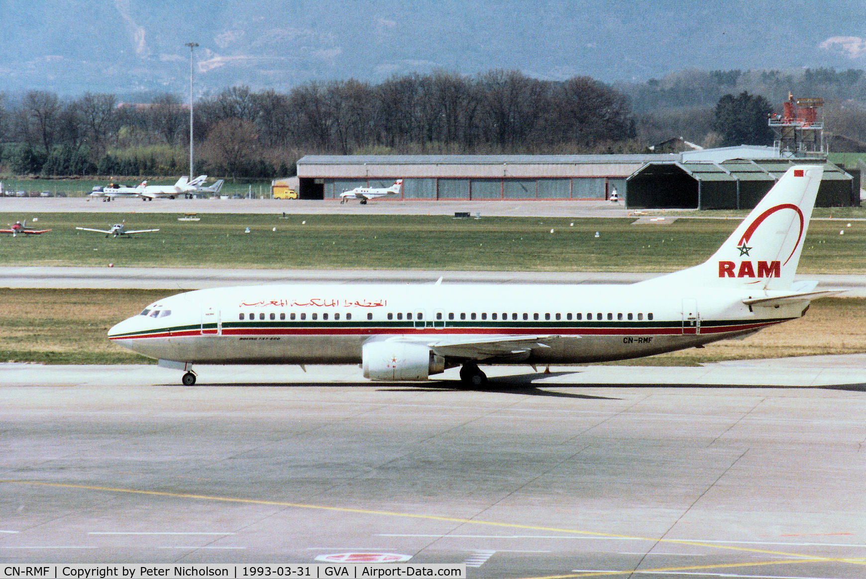 CN-RMF, 1990 Boeing 737-4B6 C/N 24807-1880, Boeing 737-4B6 of Royal Air Maroc taxying to the terminal at Geneva in March 1993.