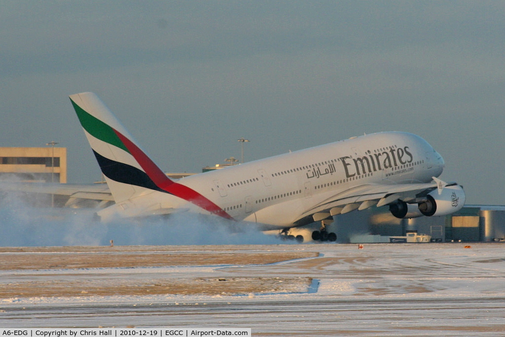 A6-EDG, 2009 Airbus A380-861 C/N 023, Emirates A380 kicking up the snow as it departs from RW05L