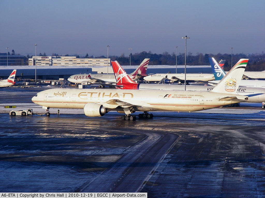 A6-ETA, 2005 Boeing 777-3FX/ER C/N 34597, Etihad B777 pushing back from its gate