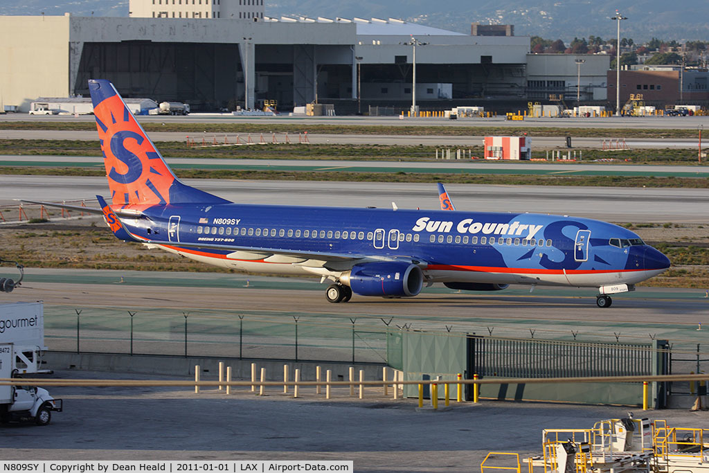 N809SY, 2005 Boeing 737-8Q8 C/N 30683, Sun Country Airlines N809SY (FLT SCX8601) from Chicago O'Hare Intl (KORD) taxiing on Taxiway Alpha to parking.