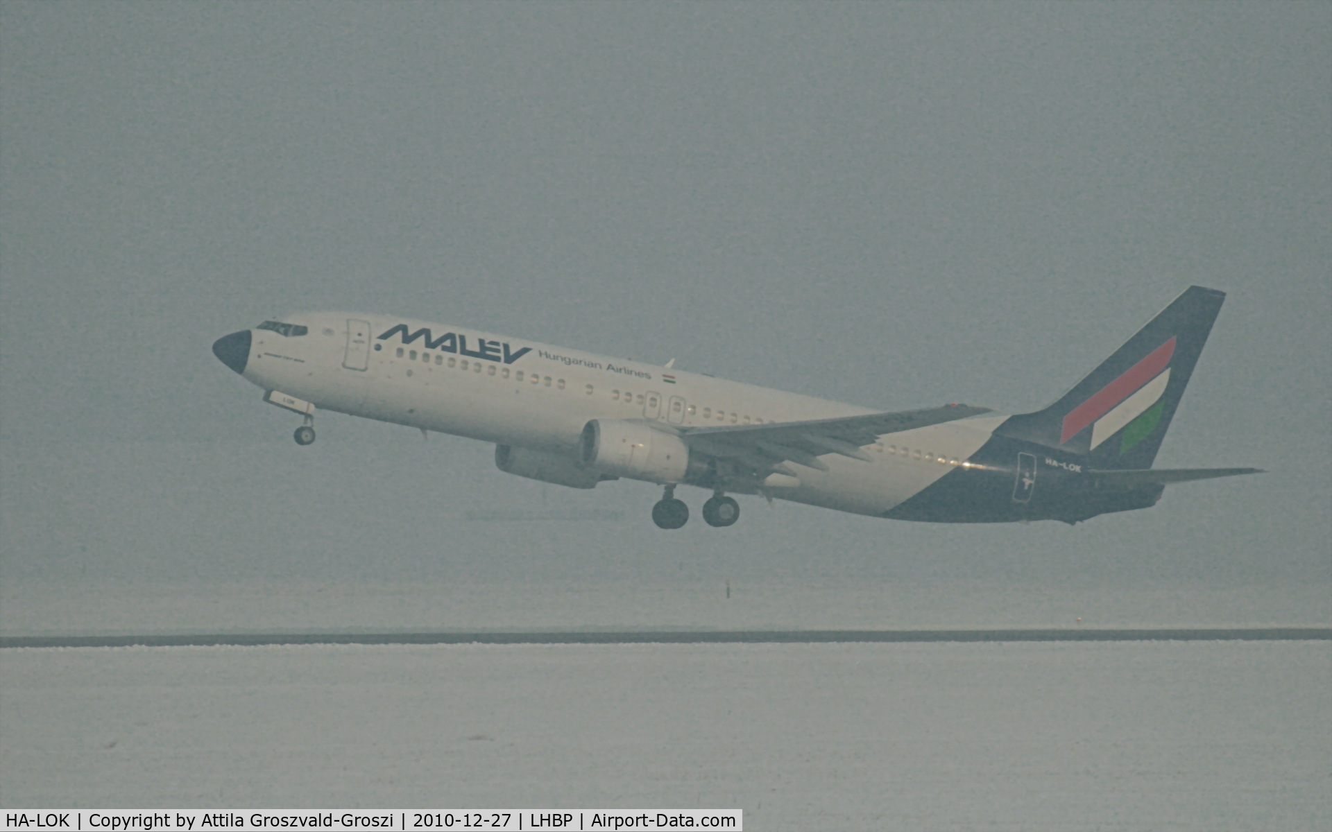 HA-LOK, 2004 Boeing 737-8Q8 C/N 30669, Budapest Ferihegy I. - Take-off in fog