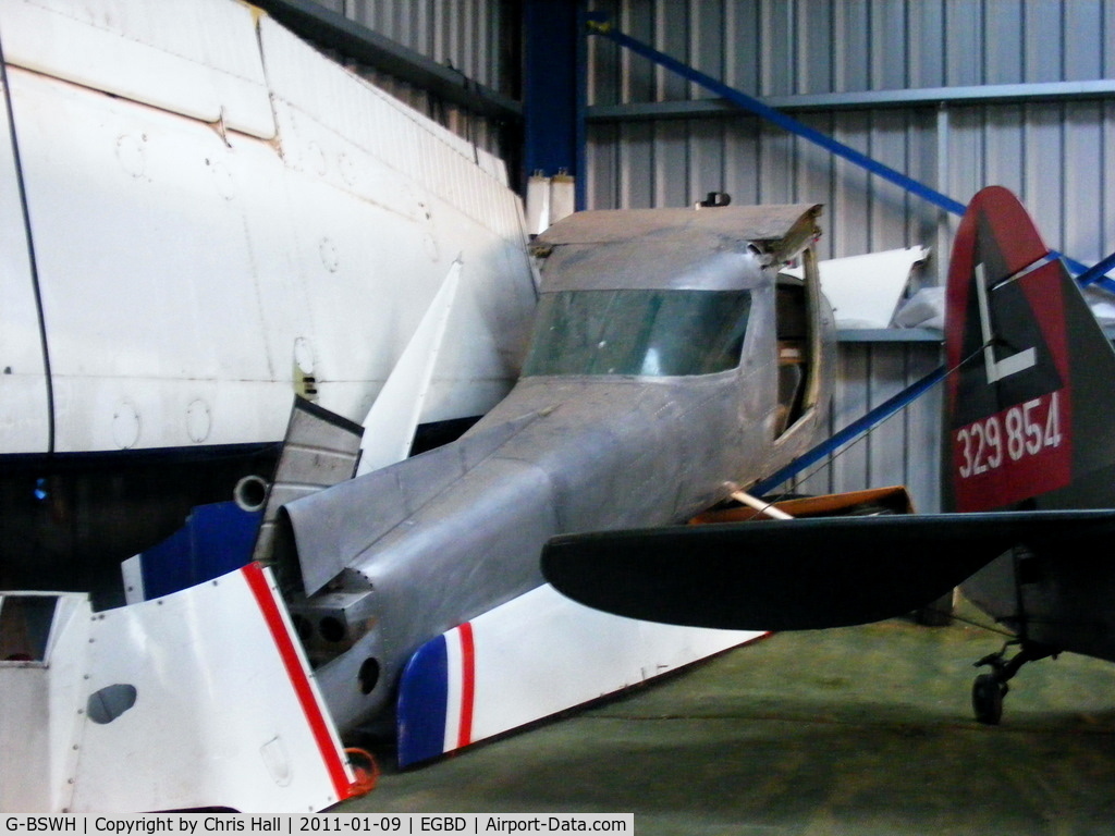 G-BSWH, 1978 Cessna 152 C/N 152-81365, stored in the corner of the main hangar