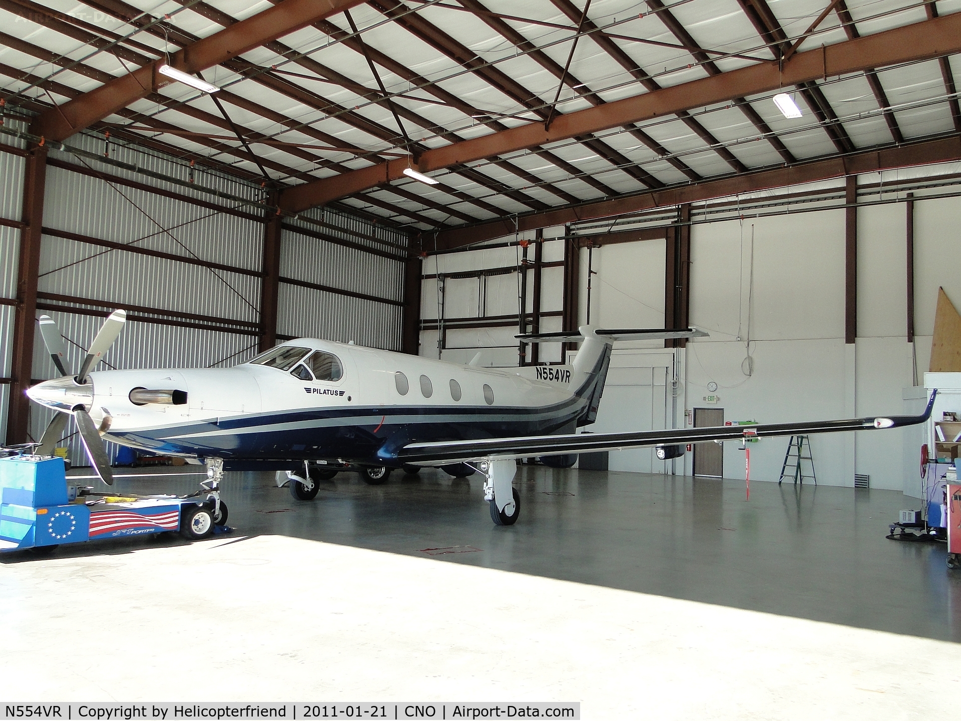N554VR, 1999 Pilatus PC-12/45 C/N 288, Has tug hooked up, unknown if coming out or going in