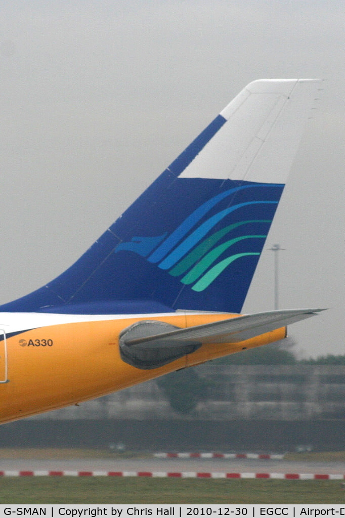 G-SMAN, 1999 Airbus A330-243 C/N 261, still wearing Garuda Indonesia colours on the tail after returning from lease