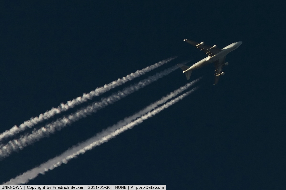 UNKNOWN, Contrails Various C/N Unknown, Cathay Pacific B747-400 cruising on its way to Asia
