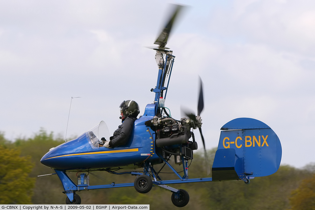 G-CBNX, 2002 Montgomerie-Bensen B-8MR Gyrocopter C/N PFA G/01A-1345, Micro trade fair visitor