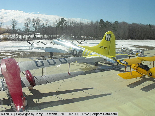 N3701G, 1944 Boeing B-17G Flying Fortress C/N 44-8543A, Parked in the sun with the snow melting at VA Beach Airport.