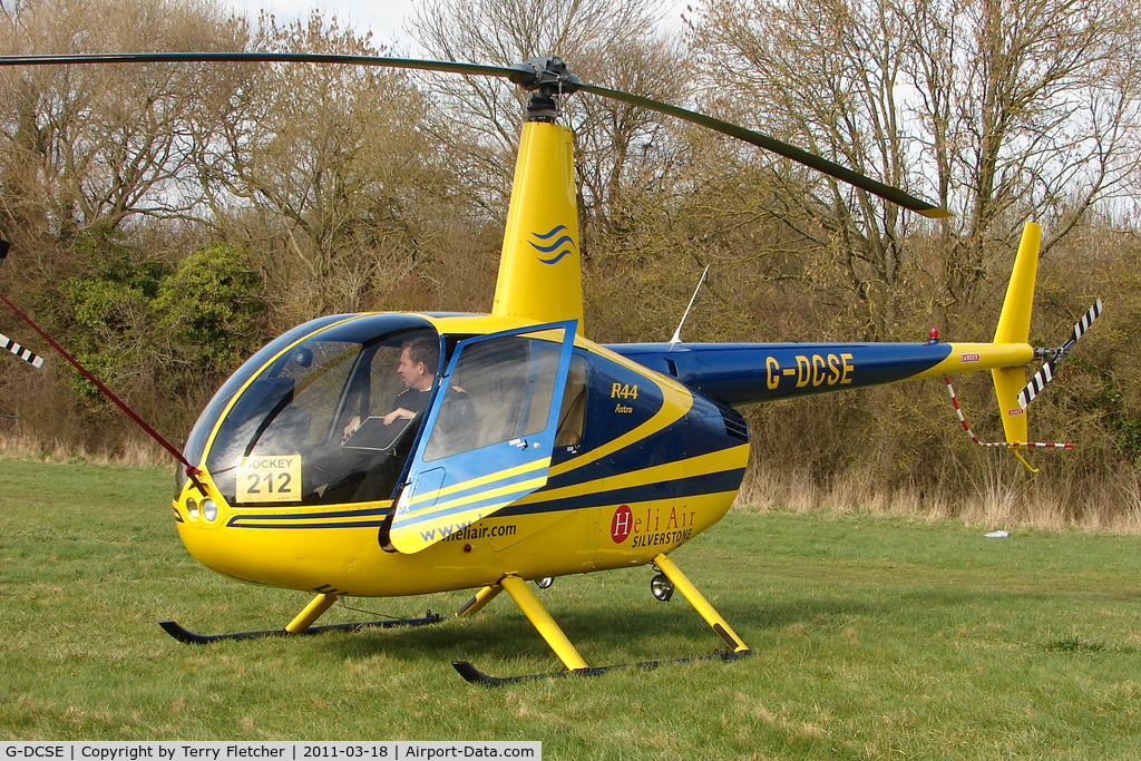 G-DCSE, 1999 Robinson R44 Astro C/N 0659, A visitor to Cheltenham Racecourse on 2011 Gold Cup Day