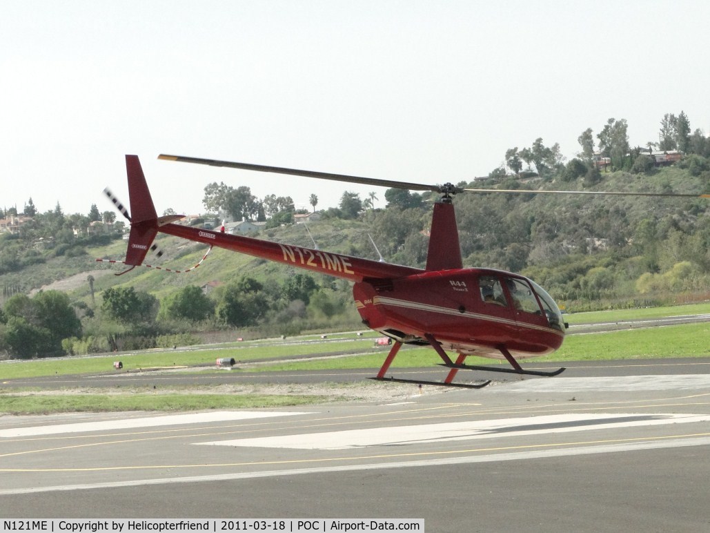 N121ME, 2007 Robinson R44 II C/N 11797, Lifting off, heading west on taxiway Sierra enroute to the freeway and then turning north heading for Delano, Ca