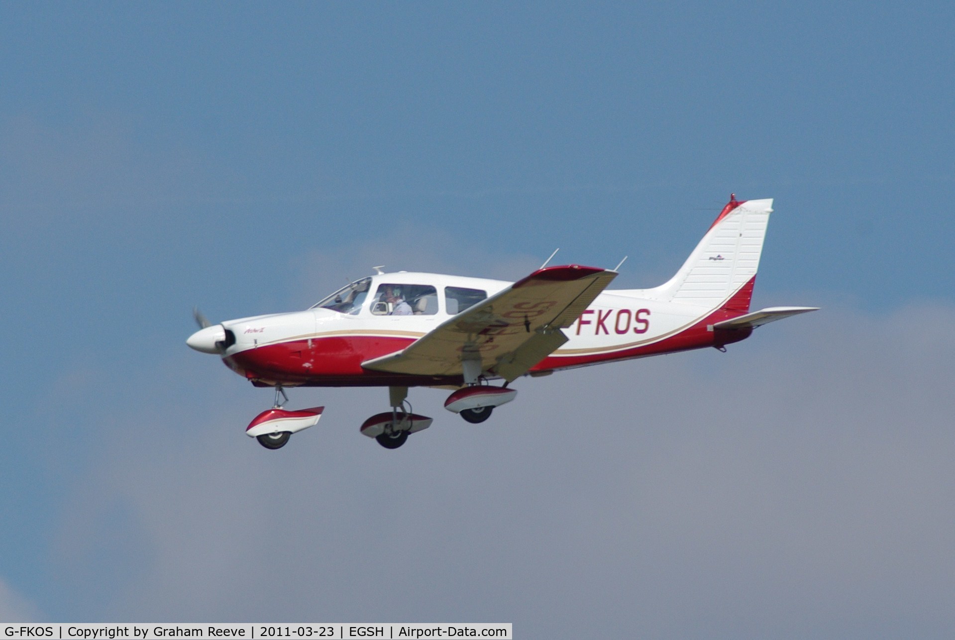 G-FKOS, 1977 Piper PA-28-181 Cherokee Archer II C/N 28-7790591, About to land.
