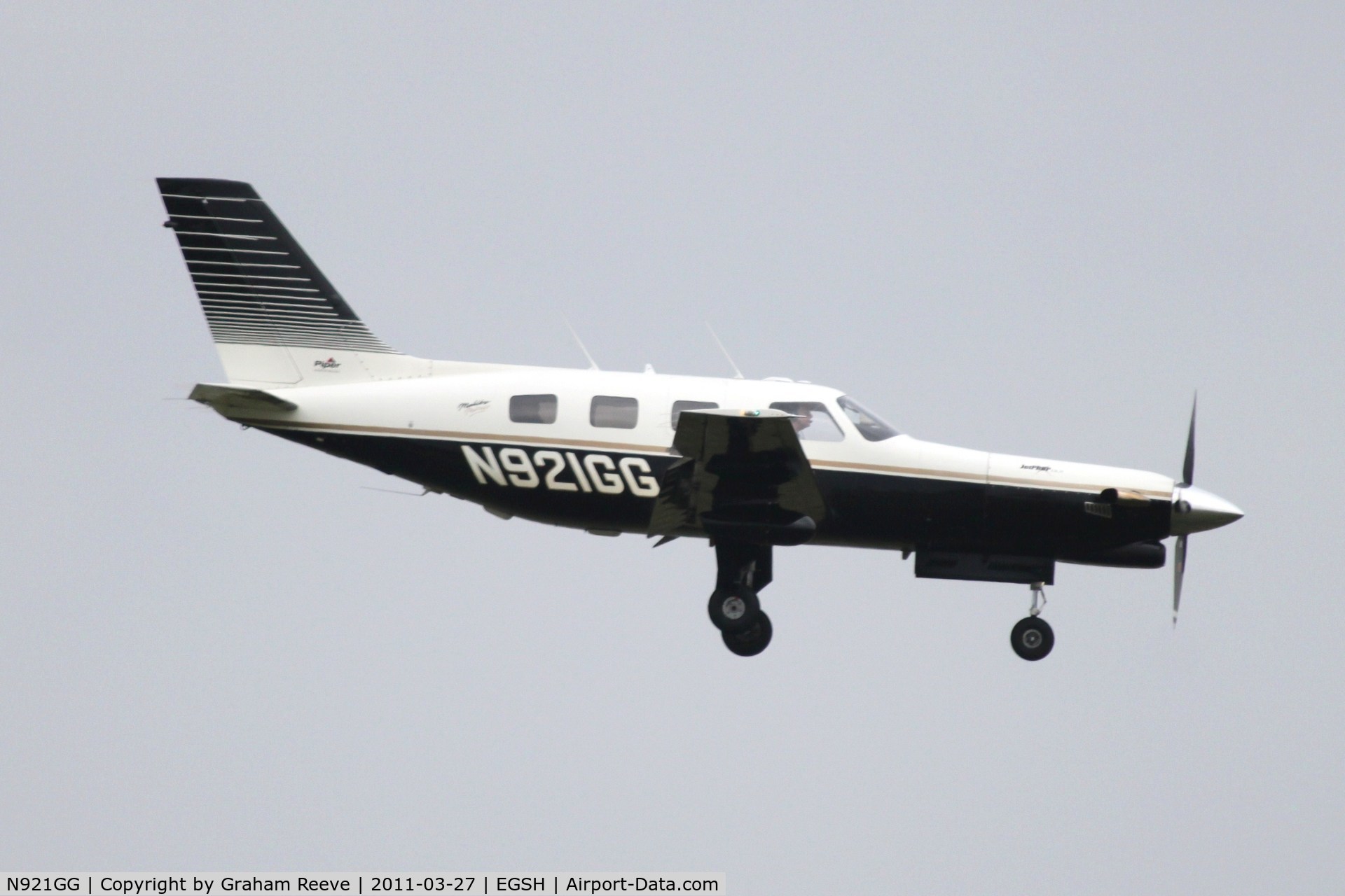 N921GG, 1998 Piper PA-46-350P Malibu Mirage C/N 4636136, about to touch down.