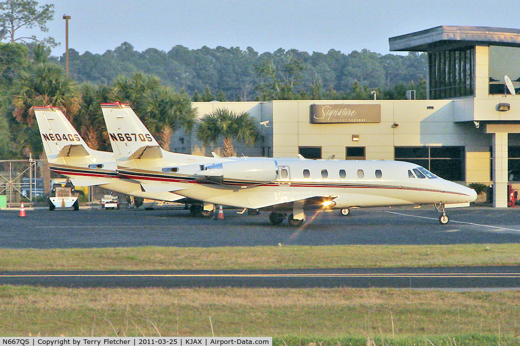 N667QS, 2004 Cessna 560XL Citation Excel C/N 560-5365, 2004 Cessna 560XL, c/n: 560-5365 and sistership N604QS on the Jacksonville In biz ramp in fading light
