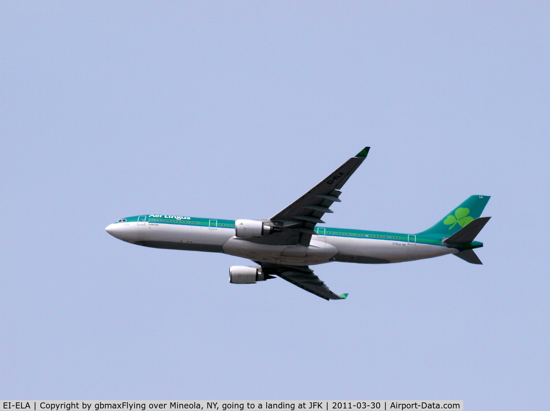 EI-ELA, 2010 Airbus A330-302X C/N 1106, Flying over Mineola, NY, going to a landing at JFK