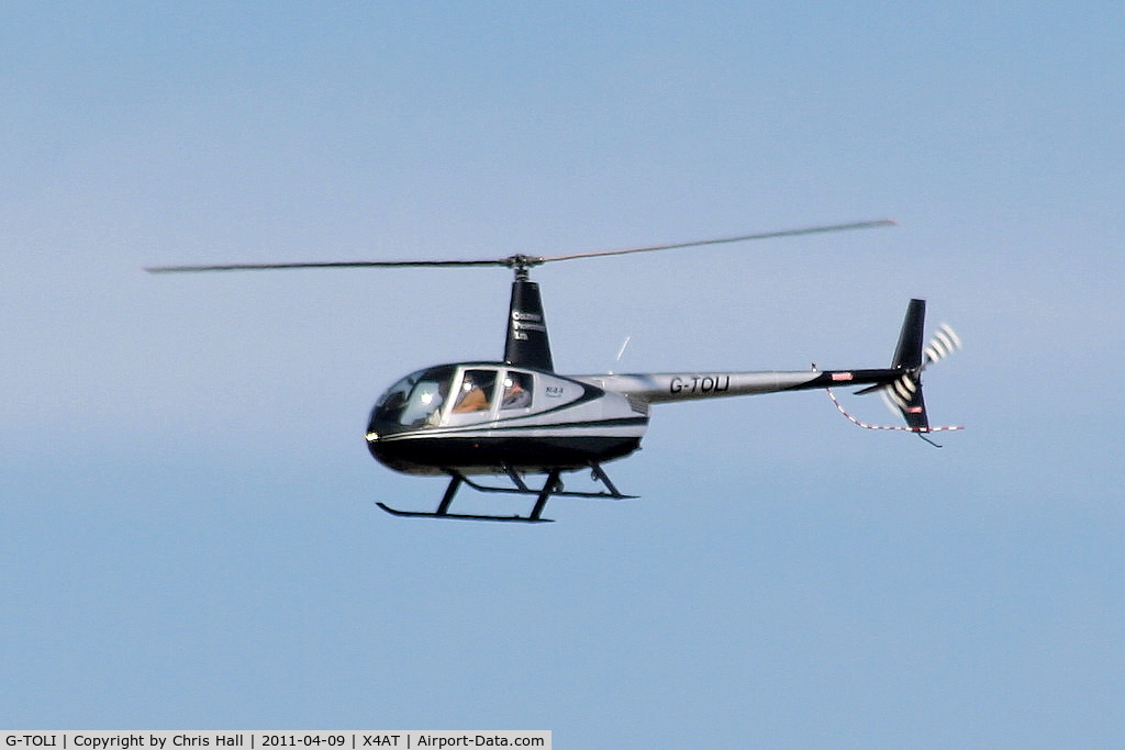 G-TOLI, 2007 Robinson R44 Raven II C/N 12009, Ferrying racegoers into Aintree for the 2011 Grand National