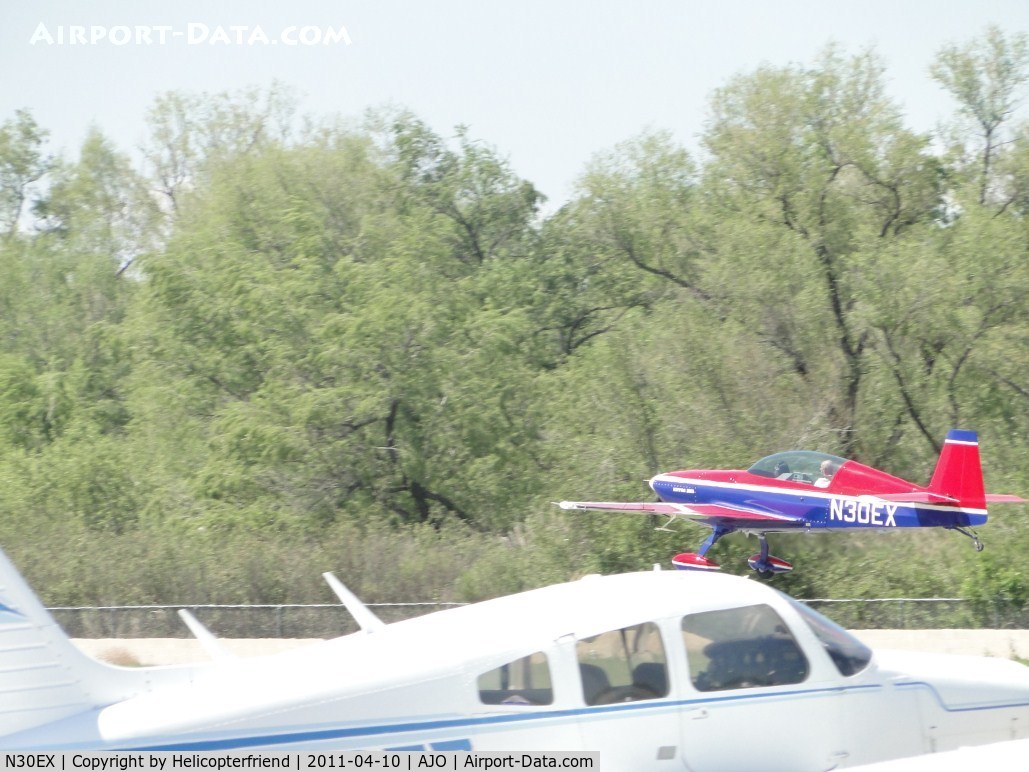 N30EX, Extra EA-300/L C/N 058, Taking off westbound