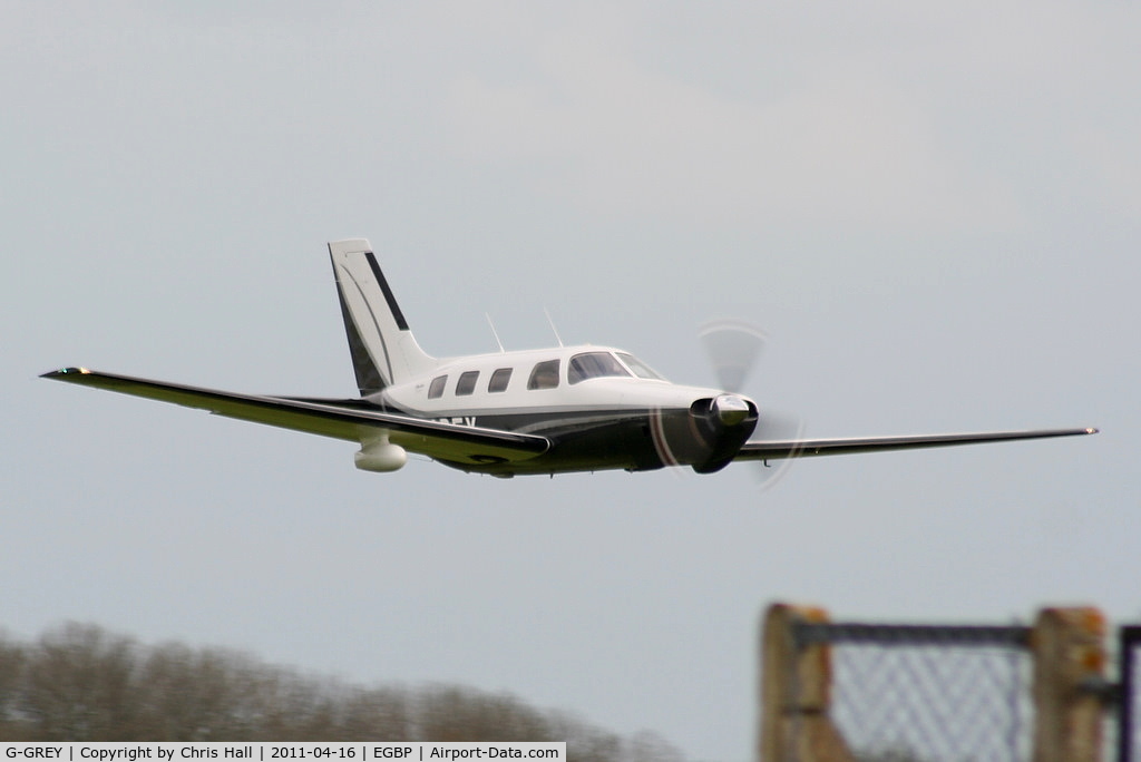 G-GREY, 1998 Piper PA-46-350P Malibu Mirage C/N 4636155, making a low flyby at Kemble