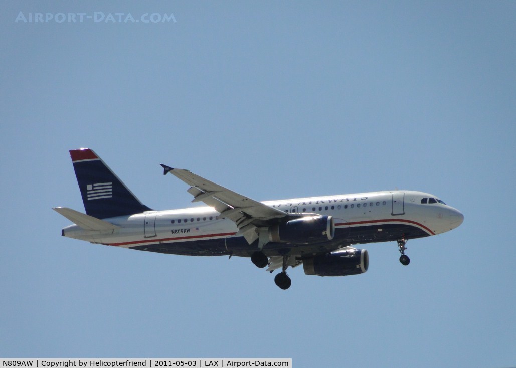 N809AW, 1999 Airbus A319-132 C/N 1111, On final for runway 24 approximately 1/2 mile east of the airport