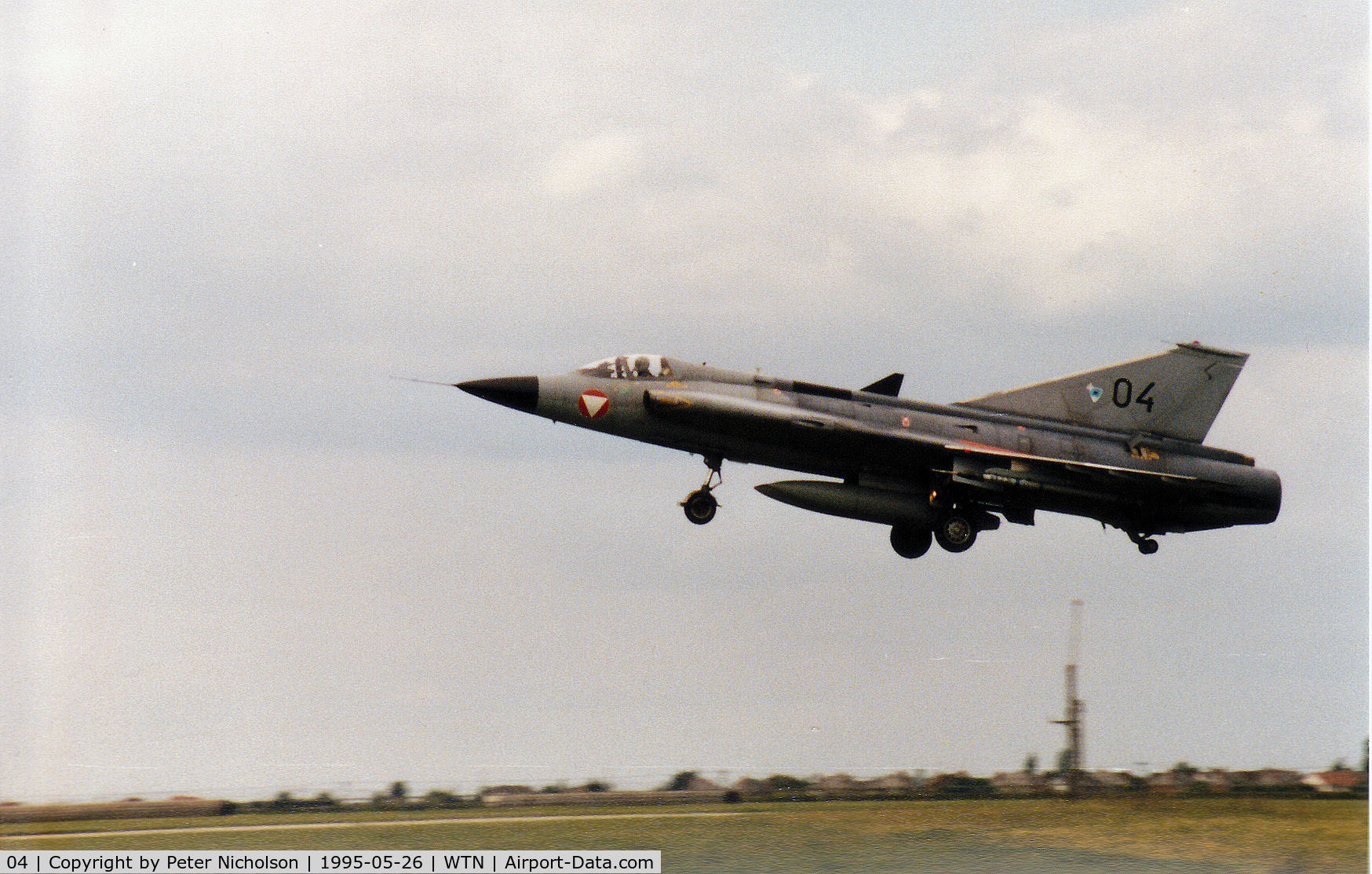 04, Saab J-35Oe MkII Draken C/N 35-1404, Austrian Air Force Saab Draken landing at RAF Waddington after an Air Combat mission in May 1995.
