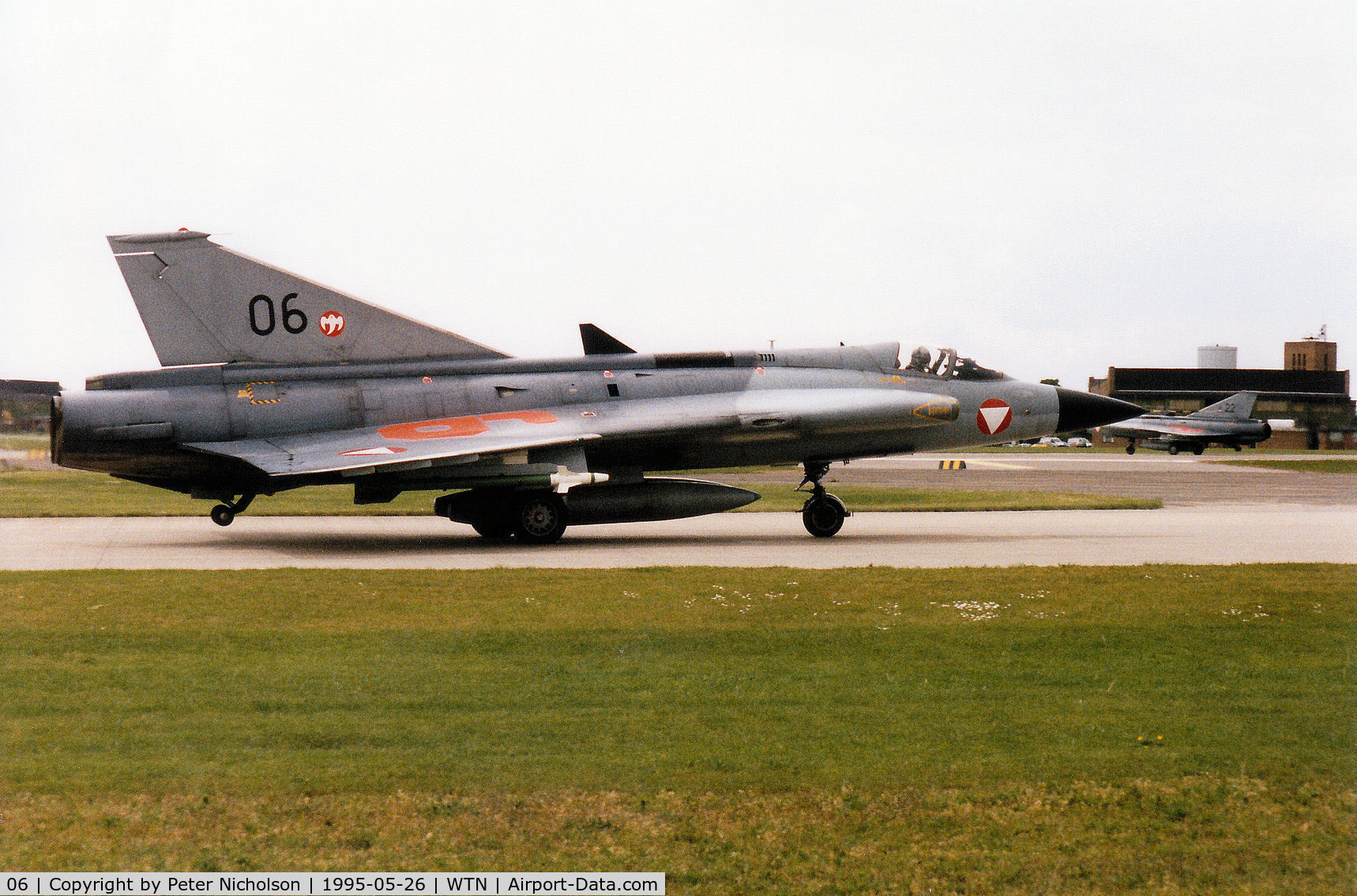 06, Saab J-35Oe MkII Draken C/N 351406, Austrian Air Force Draken of 1 Staffel on detachment to RAF Waddington joining the active runway in May 1995.