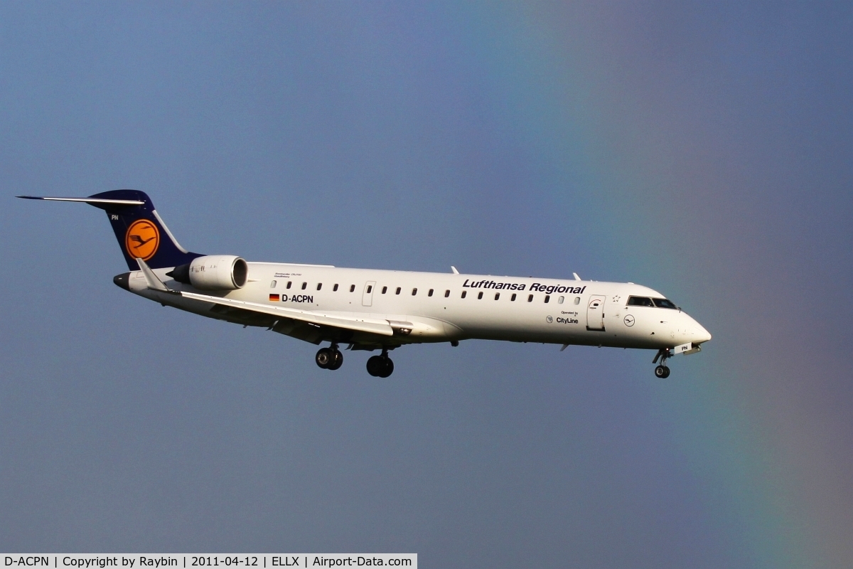 D-ACPN, 2003 Bombardier CRJ-701ER (CL-600-2C10) Regional Jet C/N 10083, Not over but under the rainbow.
