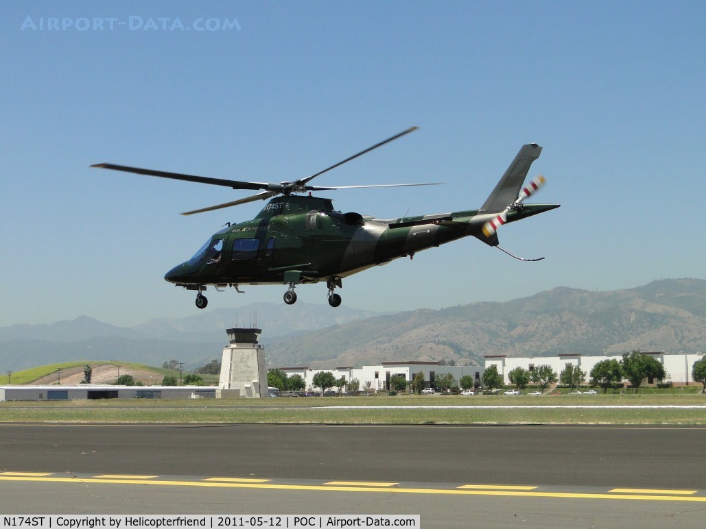 N174ST, 2001 Agusta A-109E Power C/N 11115, Lifting off westbound with two passengers