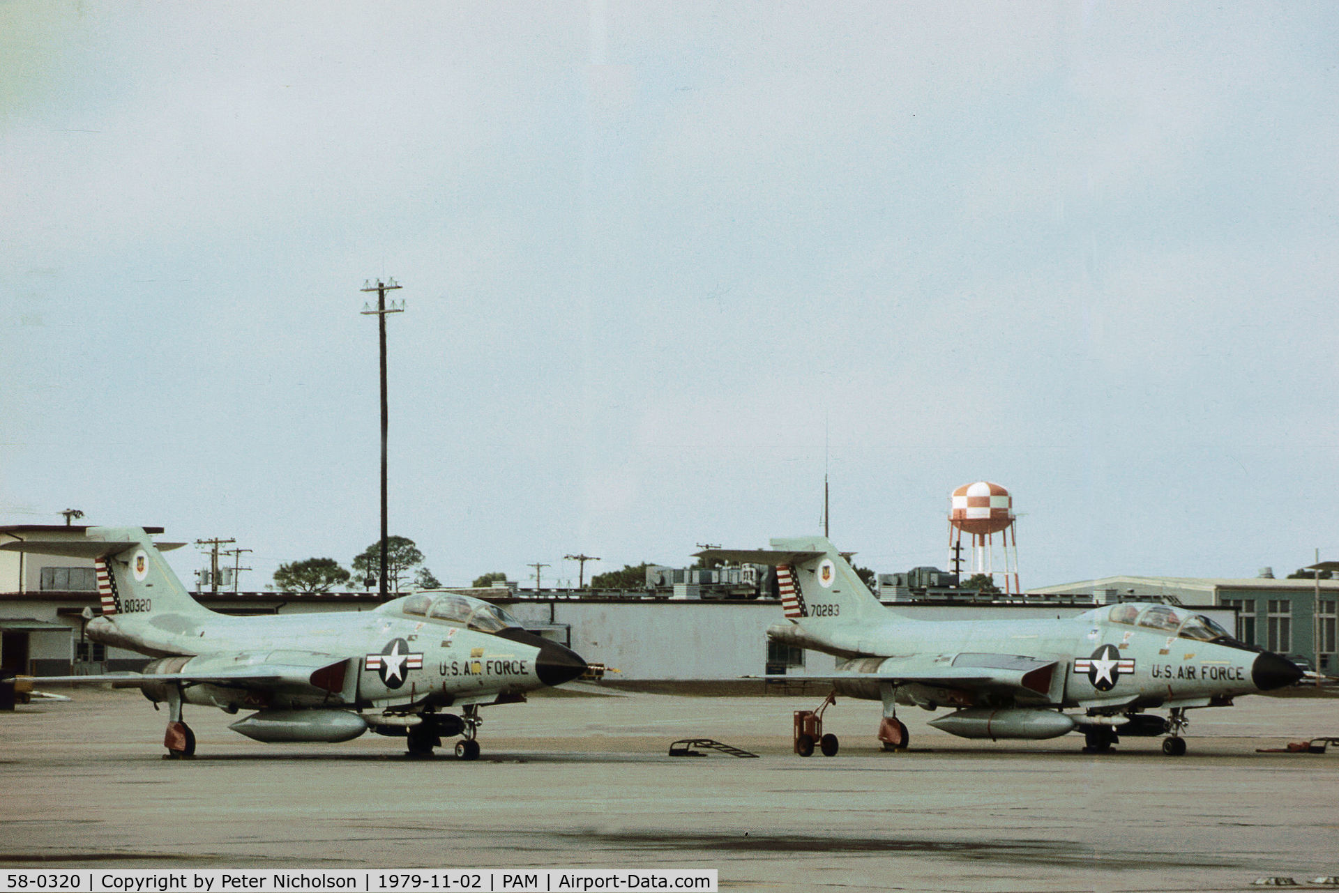 58-0320, 1958 McDonnell F-101B Voodoo C/N 692, F-101B Voodoo with companion 57-0283 at Tyndall AFB in November 1979.