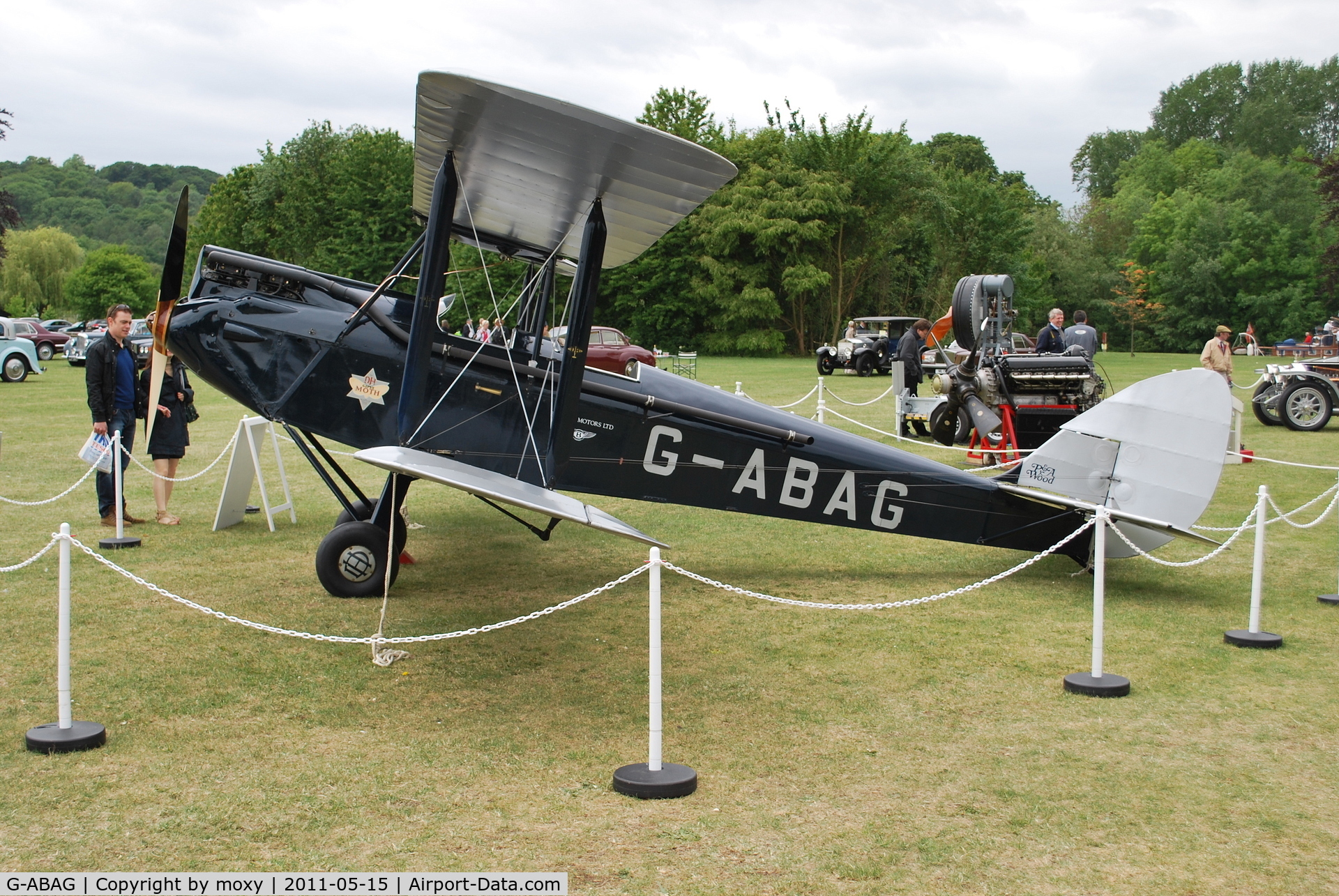 G-ABAG, 1930 De Havilland DH60G Gipsy Moth C/N 1259, Gipsy Moth at a Rolls Royce and Bentley owners do at Runnymede. These were real Rollers and Bentleys, not the junk now produced by BMW and Volkswagen.