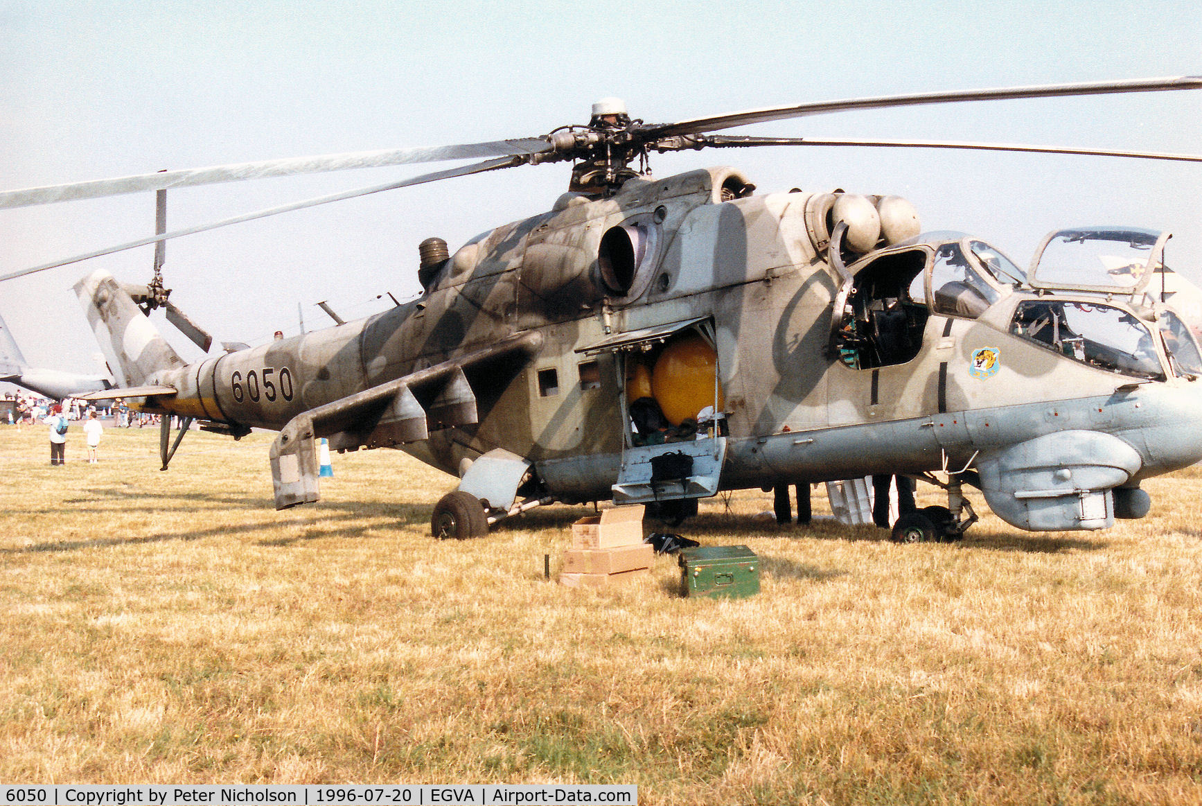 6050, Mil Mi-24DU Hind C/N 7306050, Mi-24DU Hind [dual-control training version of the Hind gunship helicopter] of 331 Squadron Czech Air Force on display at the 1996 Royal Intnl Air Tattoo at RAF Fairford.
